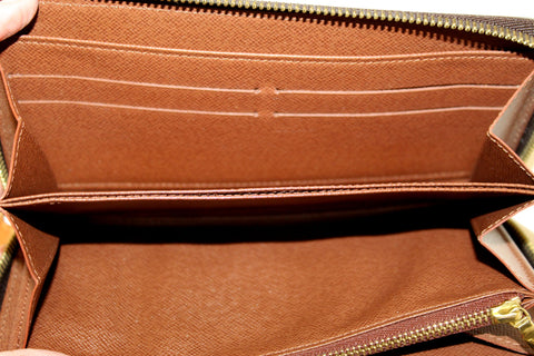 Authentic Louis Vuitton Classic Monogram Canvas Zippy with Brown Interior Wallet