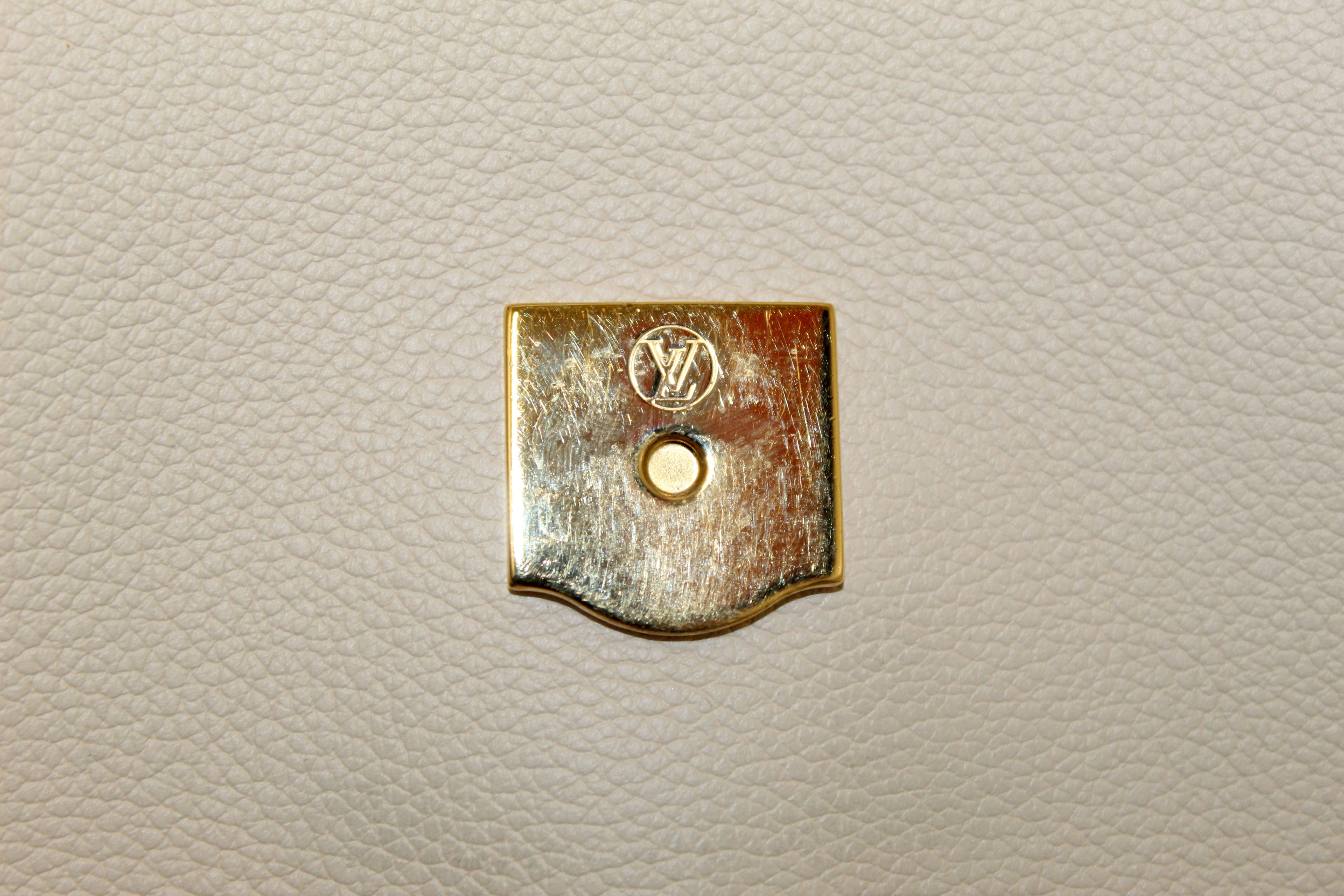 Authentic Louis Vuitton Classic Monogram Canvas with Creme Leather Vaugirard Bag