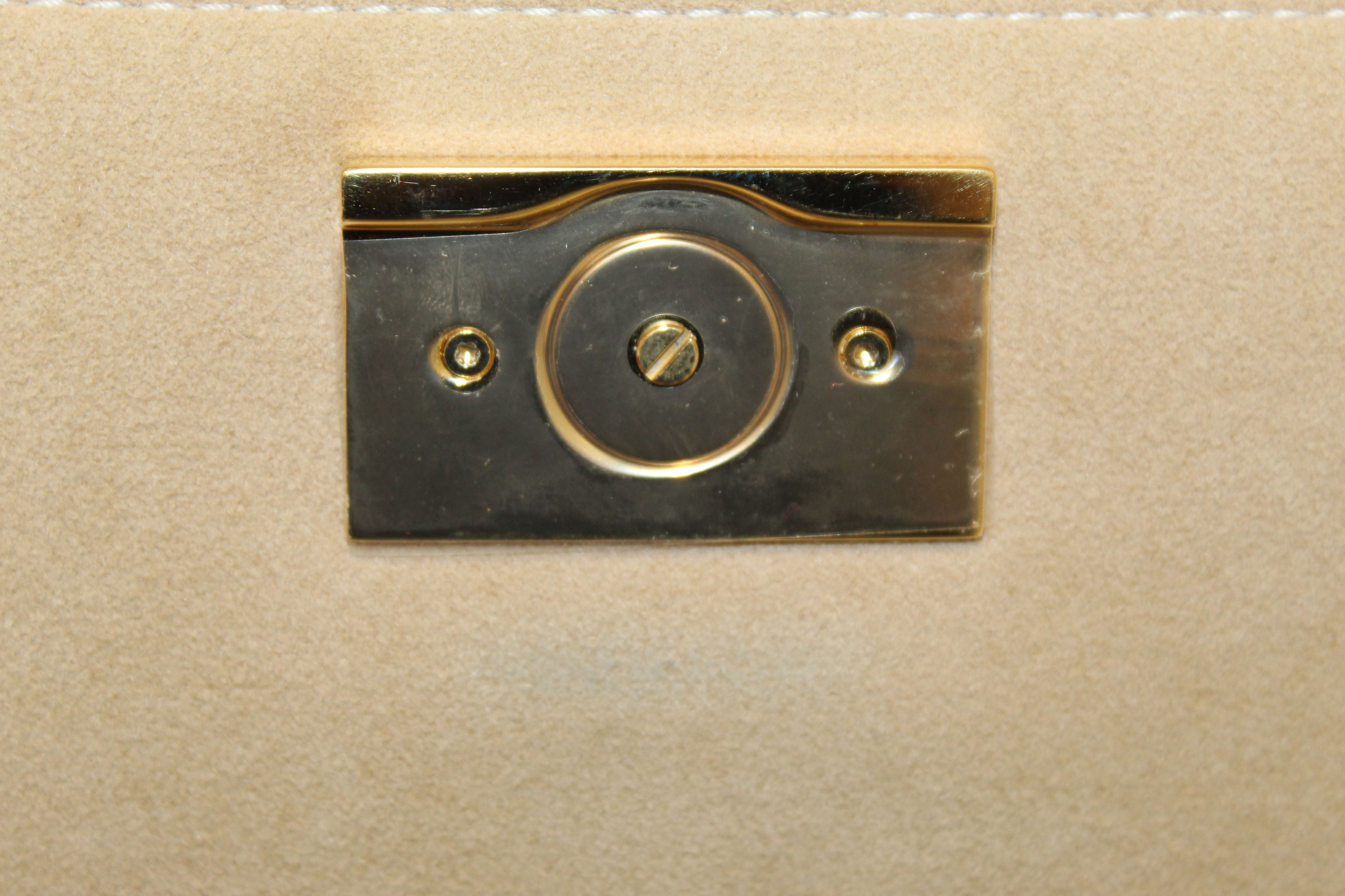 Authentic Louis Vuitton Classic Monogram Canvas with Creme Leather Vaugirard Bag