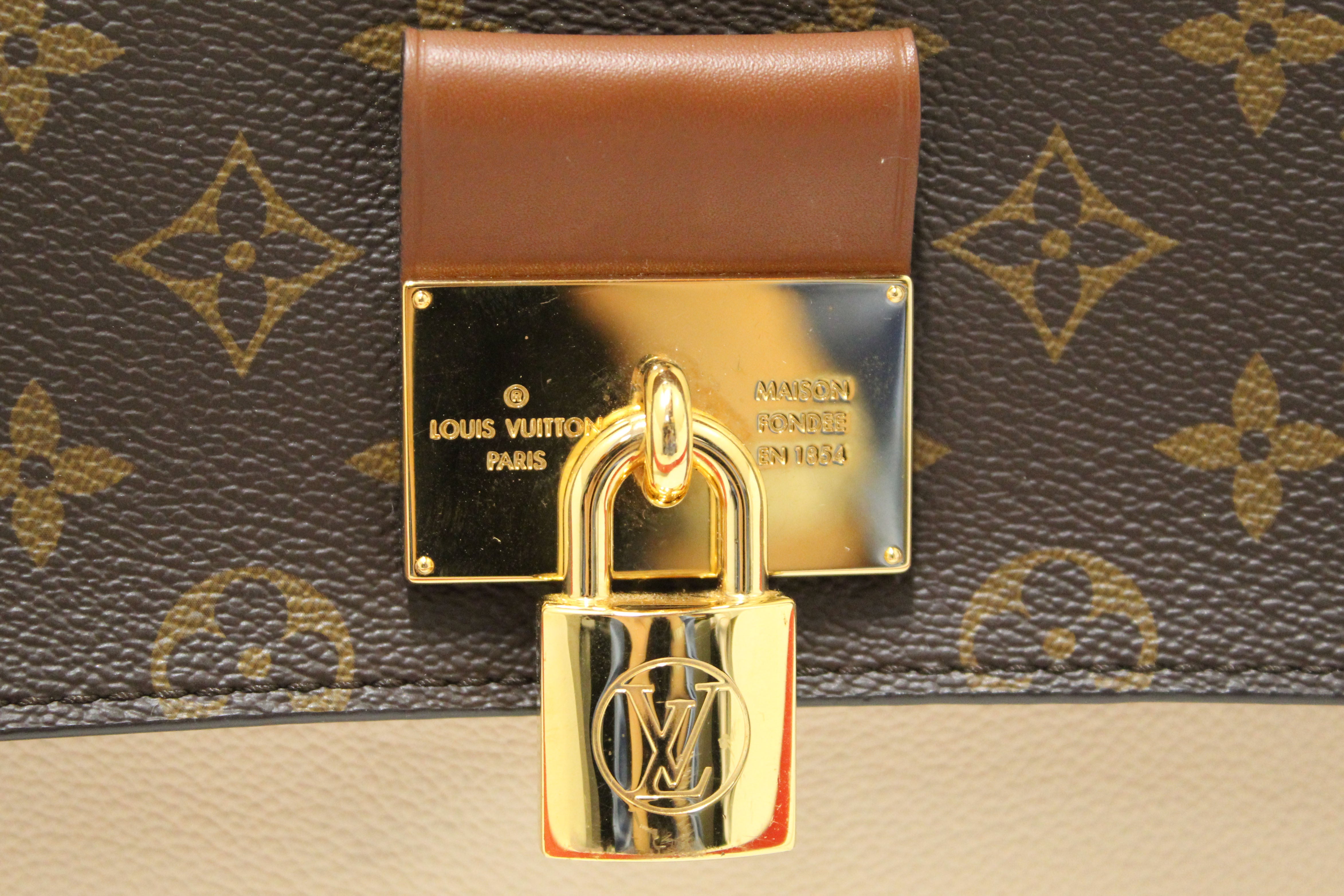 Authentic Louis Vuitton Classic Monogram Canvas with Creme Leather Vaugirard Bag