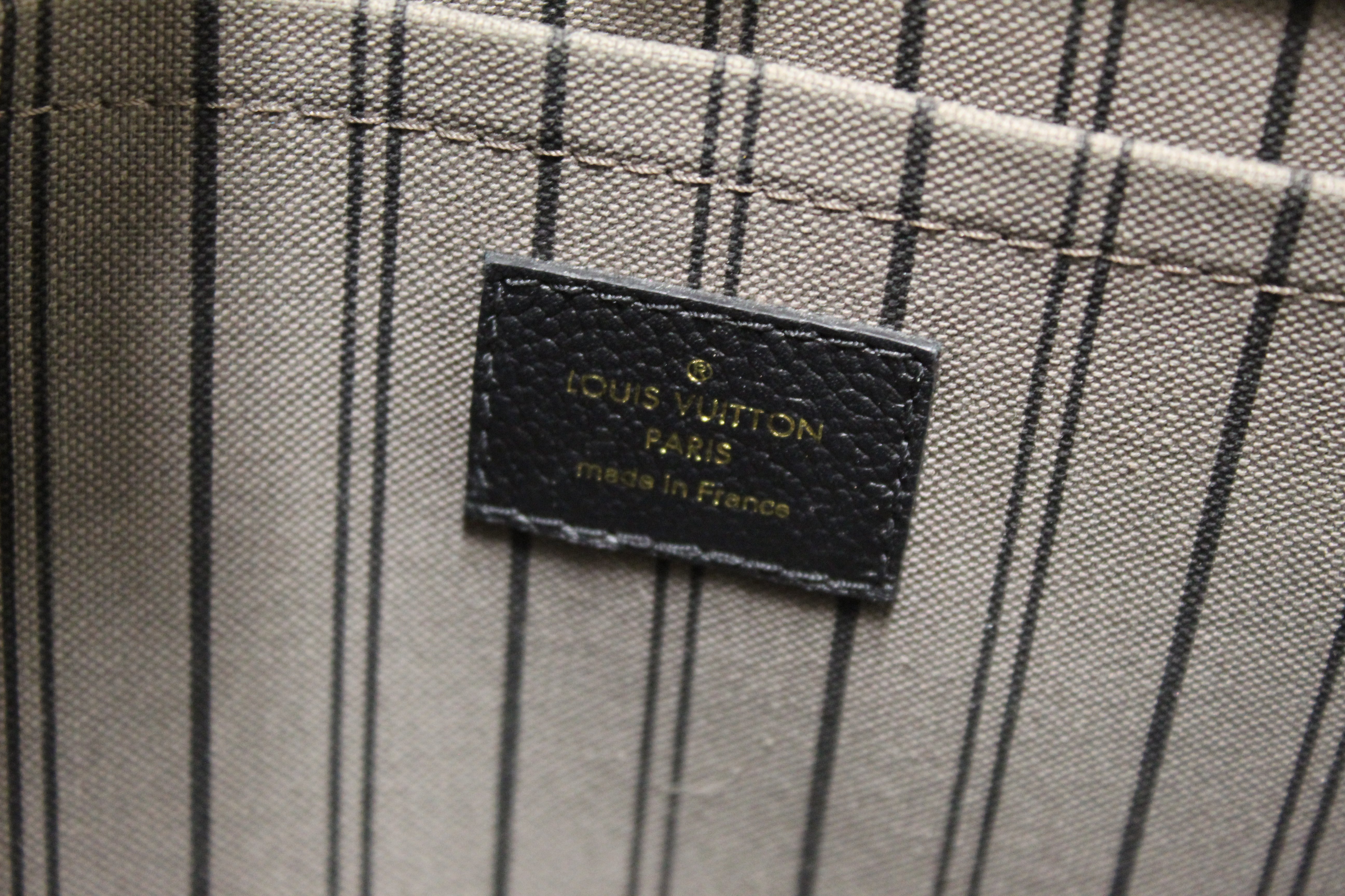 Authentic Louis Vuitton Black Monogram Empreinte Leather Montaigne MM Bag