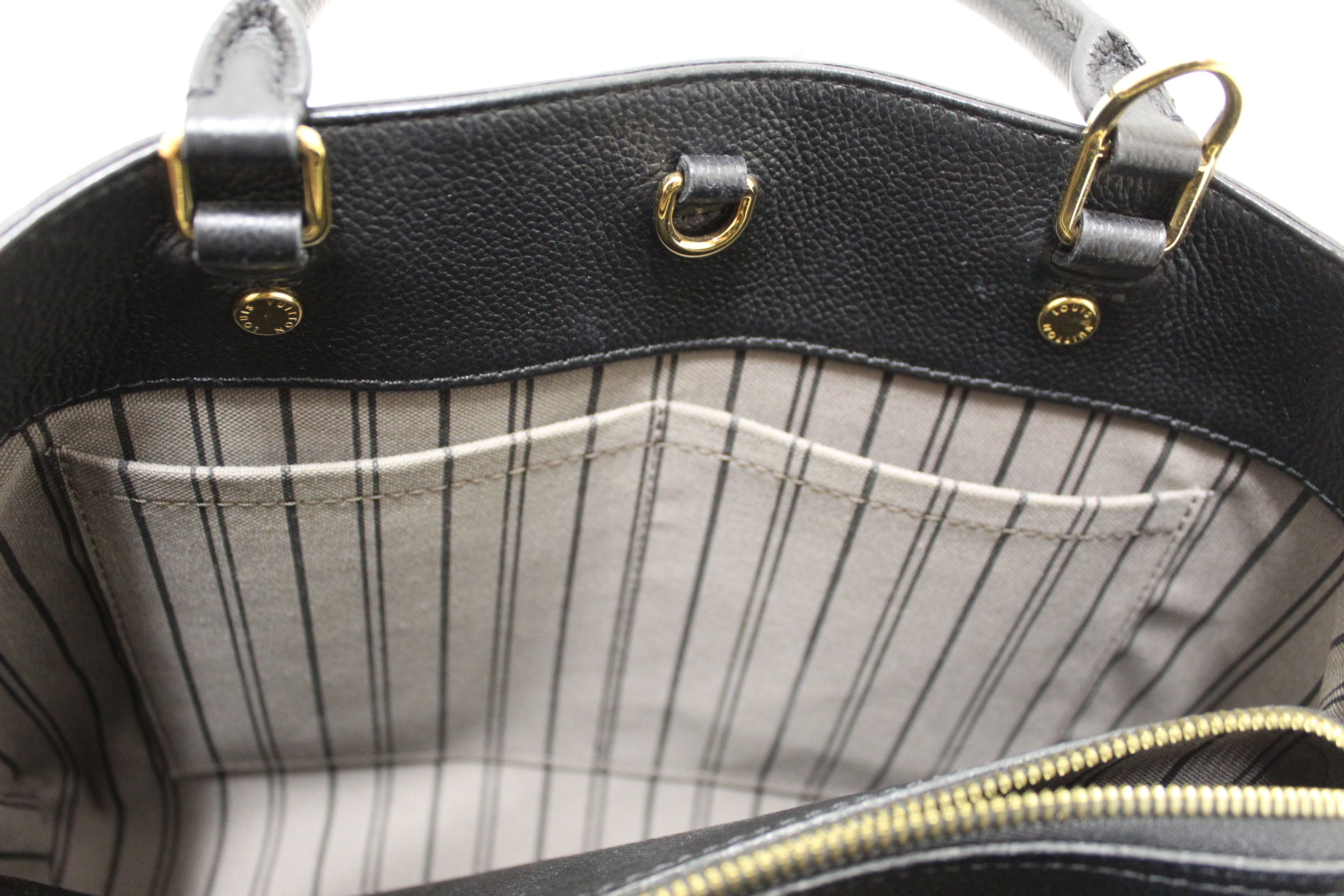 Authentic Louis Vuitton Black Monogram Empreinte Leather Montaigne MM Bag