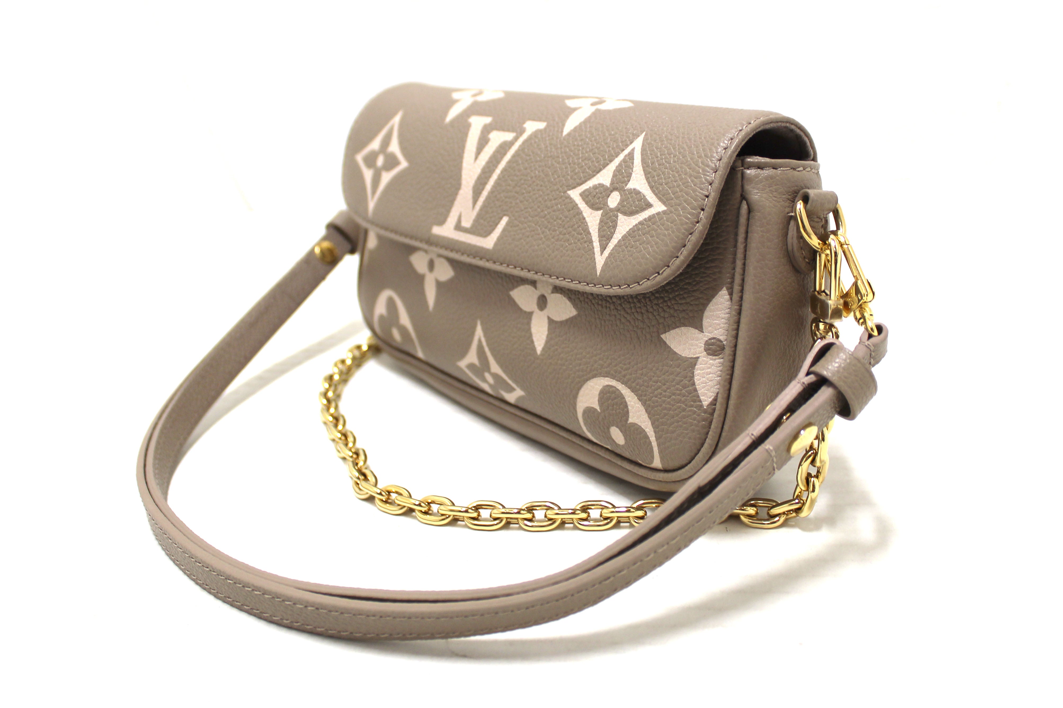 Authentic Louis Vuitton Grey/Cream Bicolor Monogram Empreinte Wallet on Chain Ivy Bag