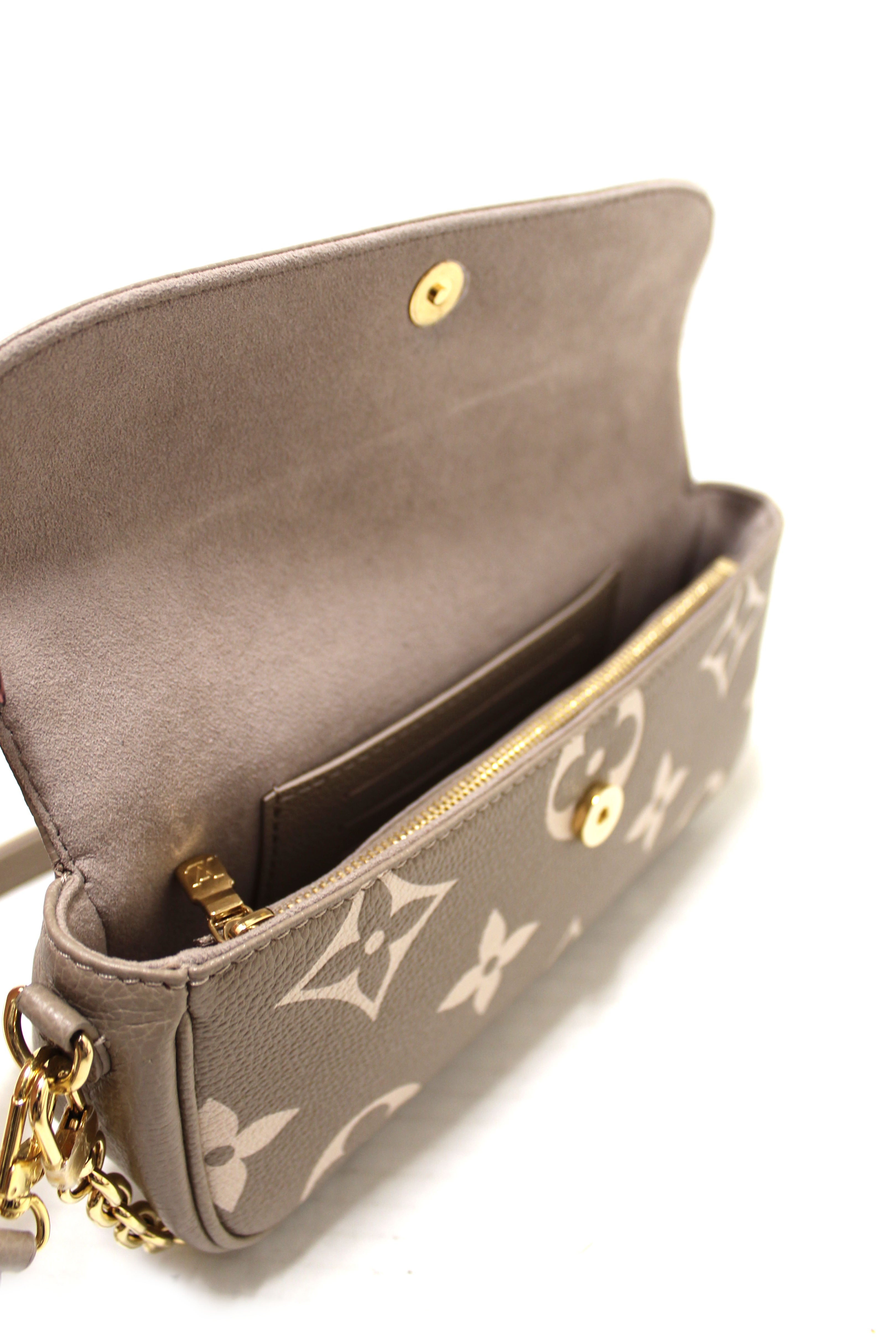 Authentic Louis Vuitton Grey/Cream Bicolor Monogram Empreinte Wallet on Chain Ivy Bag