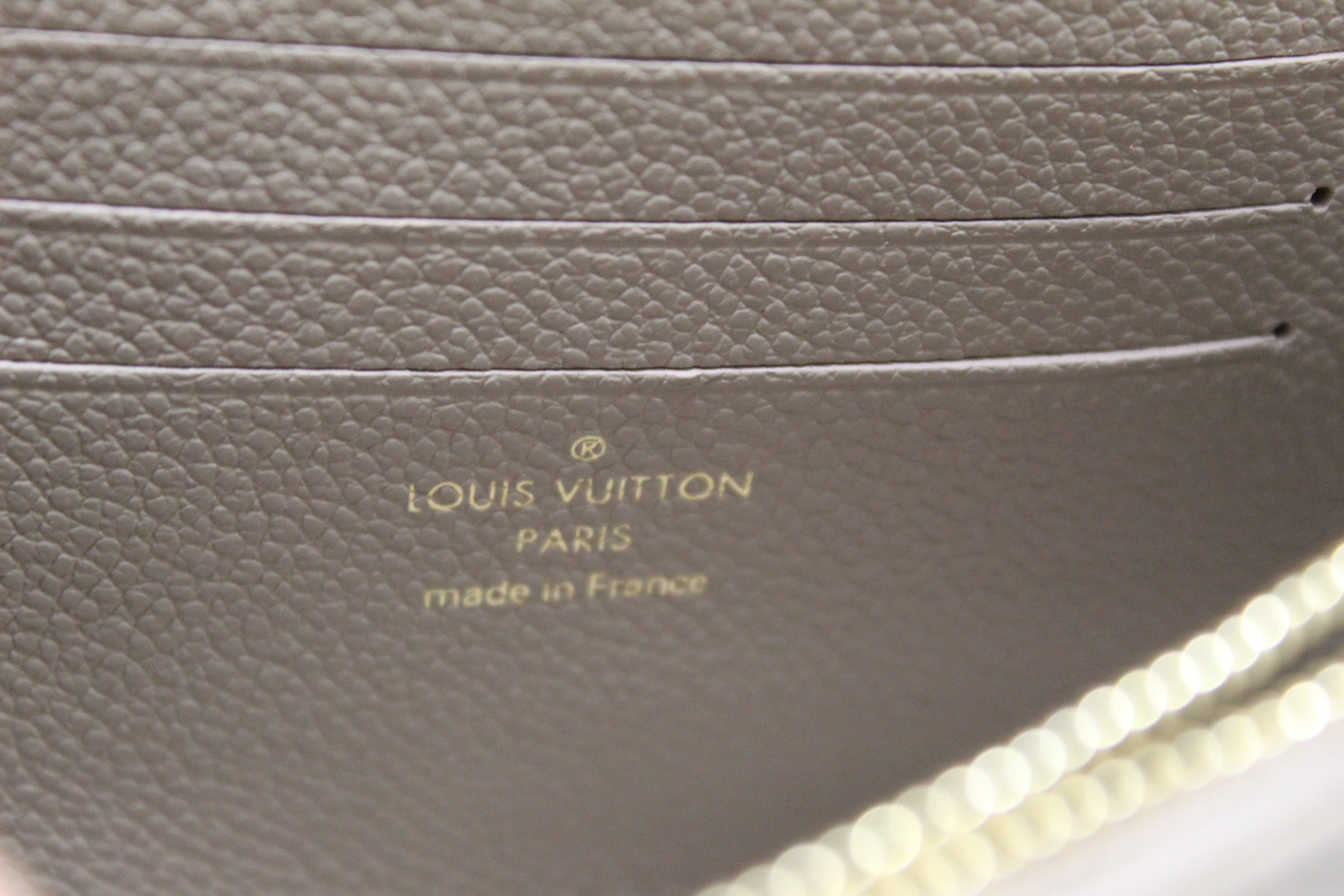 Authentic Louis Vuitton Grey/Cream Bicolor Monogram Empreinte Wallet on Chain Ivy Bag