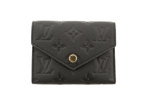 Authentic Louis Vuitton Black Monogram Empreinte Leather Victorine Wallet