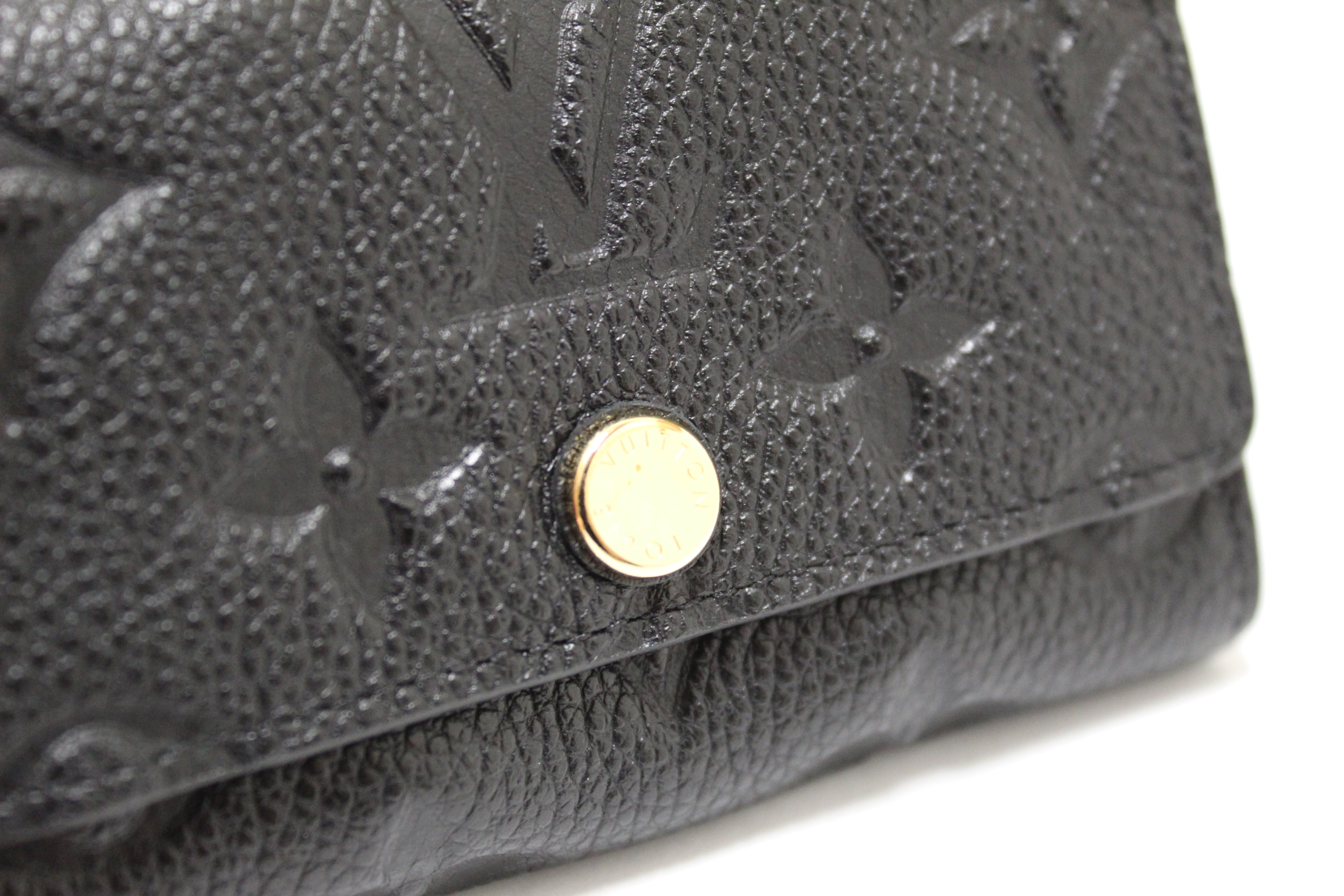 Authentic Louis Vuitton Black Monogram Empreinte Leather 6 Key Holder