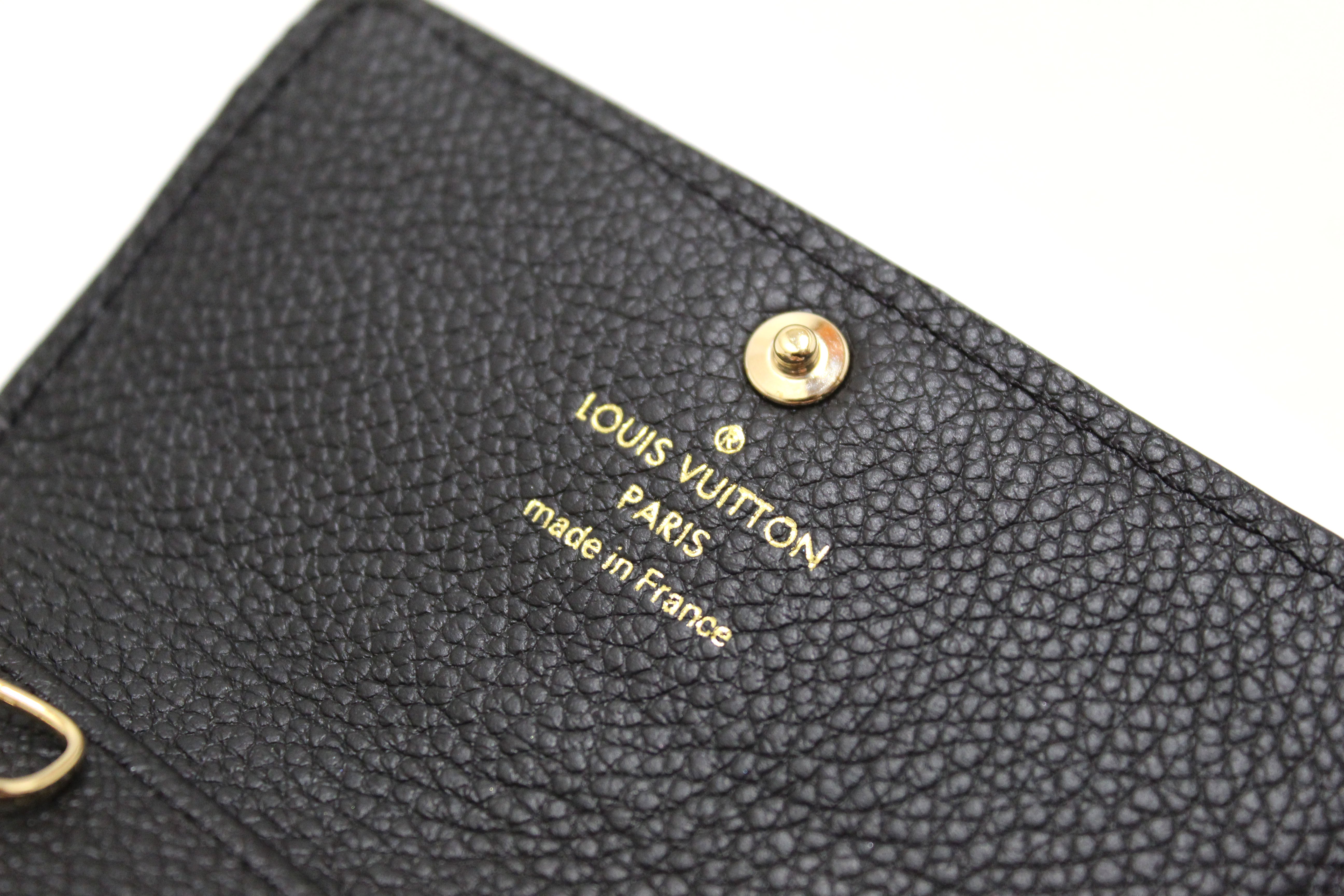 Authentic Louis Vuitton Black Monogram Empreinte Leather 6 Key Holder
