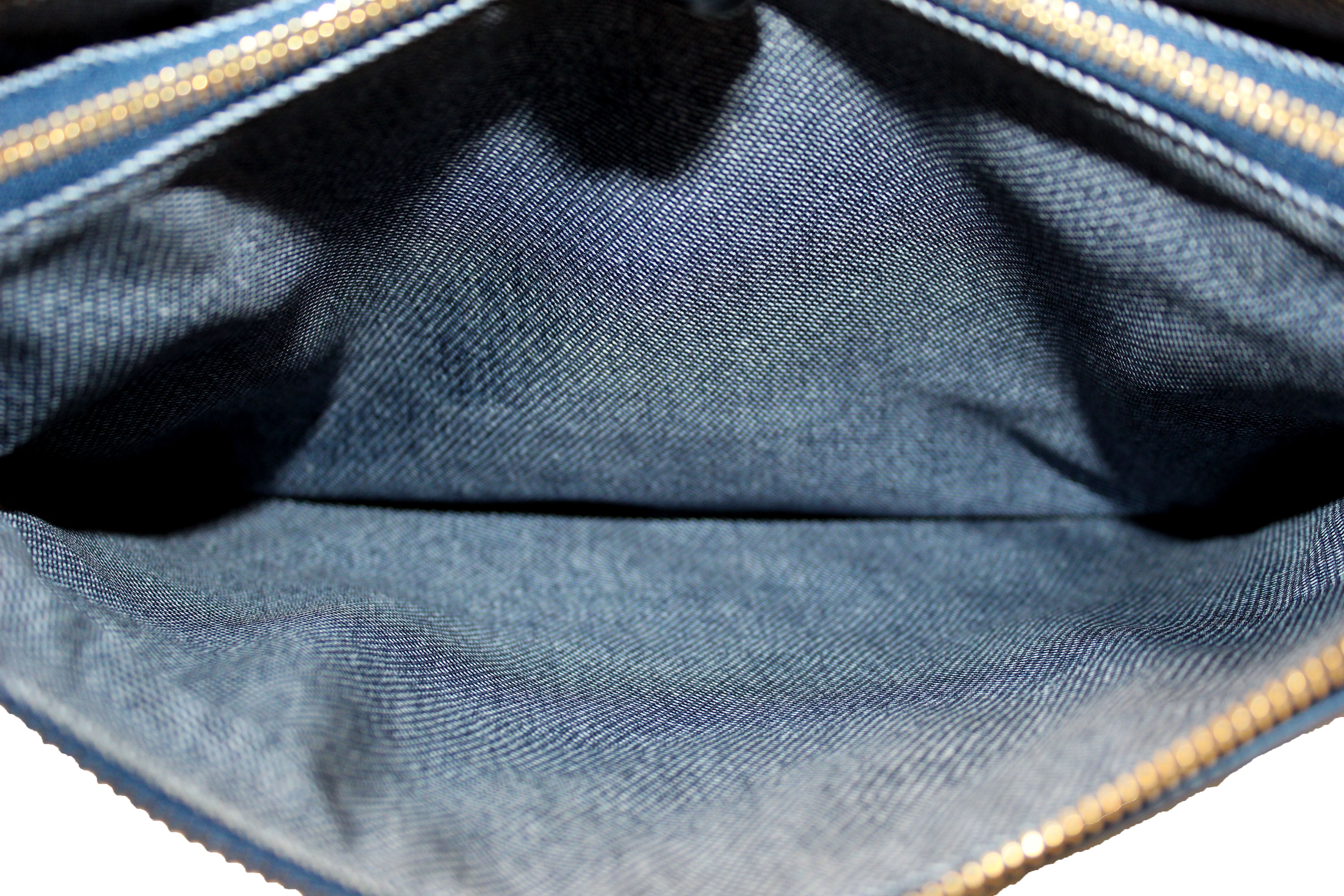 Authentic Louis Vuitton Denim Blue Lambskin Embossed Monogram Coussin PM Bag