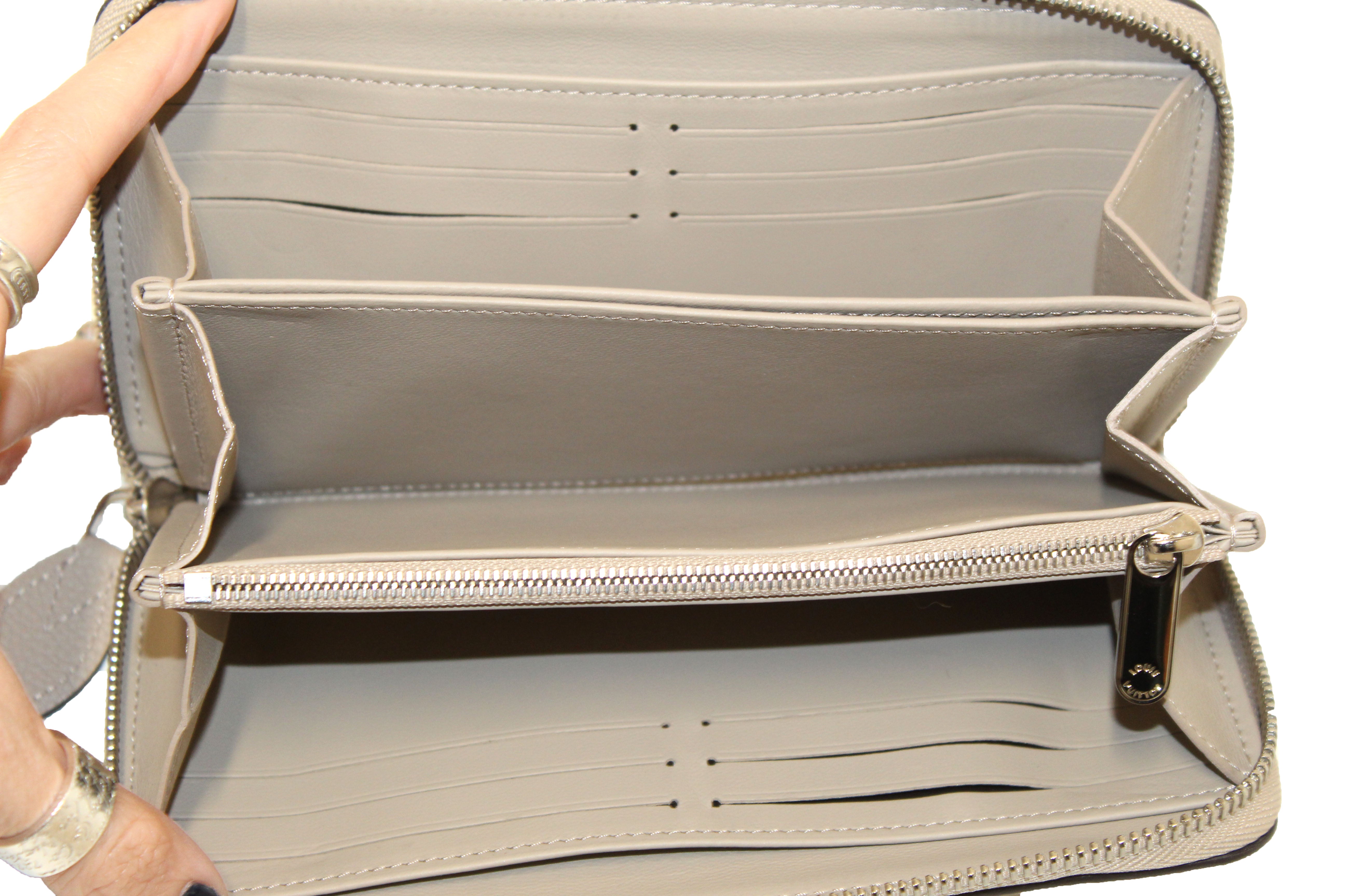 Authentic Louis Vuitton Galet Mahina Leather Zippy Wallet