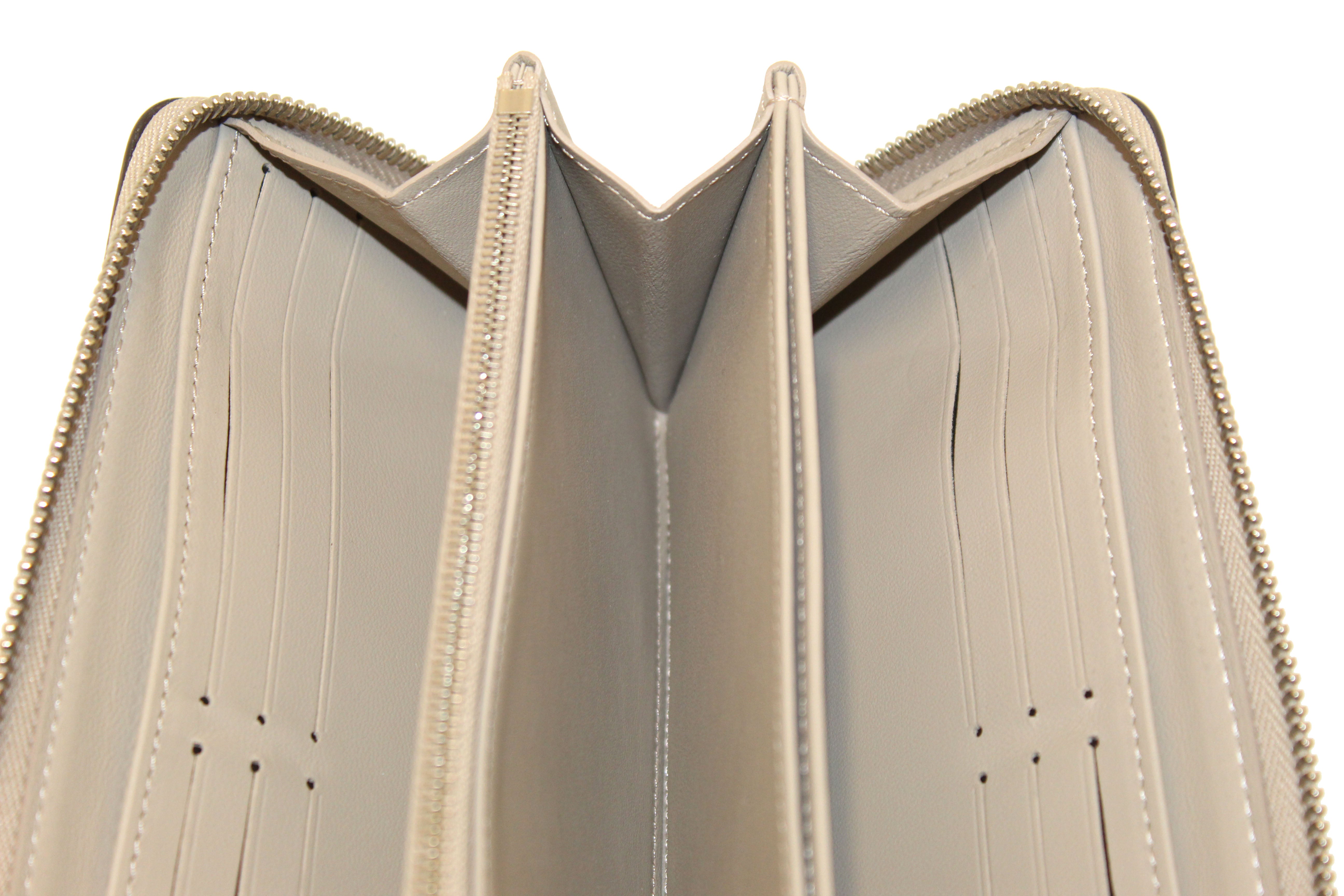 Authentic Louis Vuitton Galet Mahina Leather Zippy Wallet