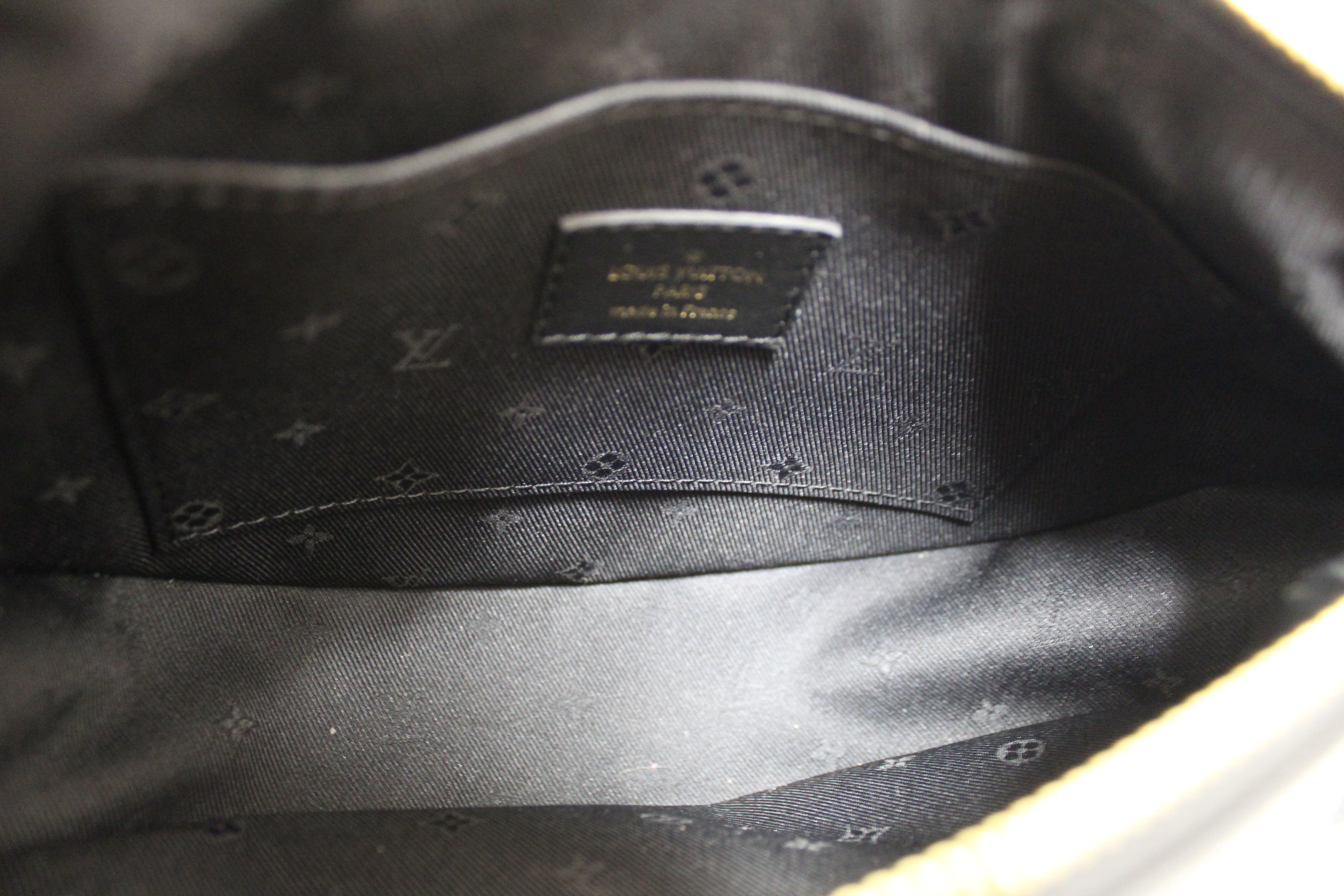 Authentic Louis Vuitton Black Bubblegram Leather Over the Moon Bag