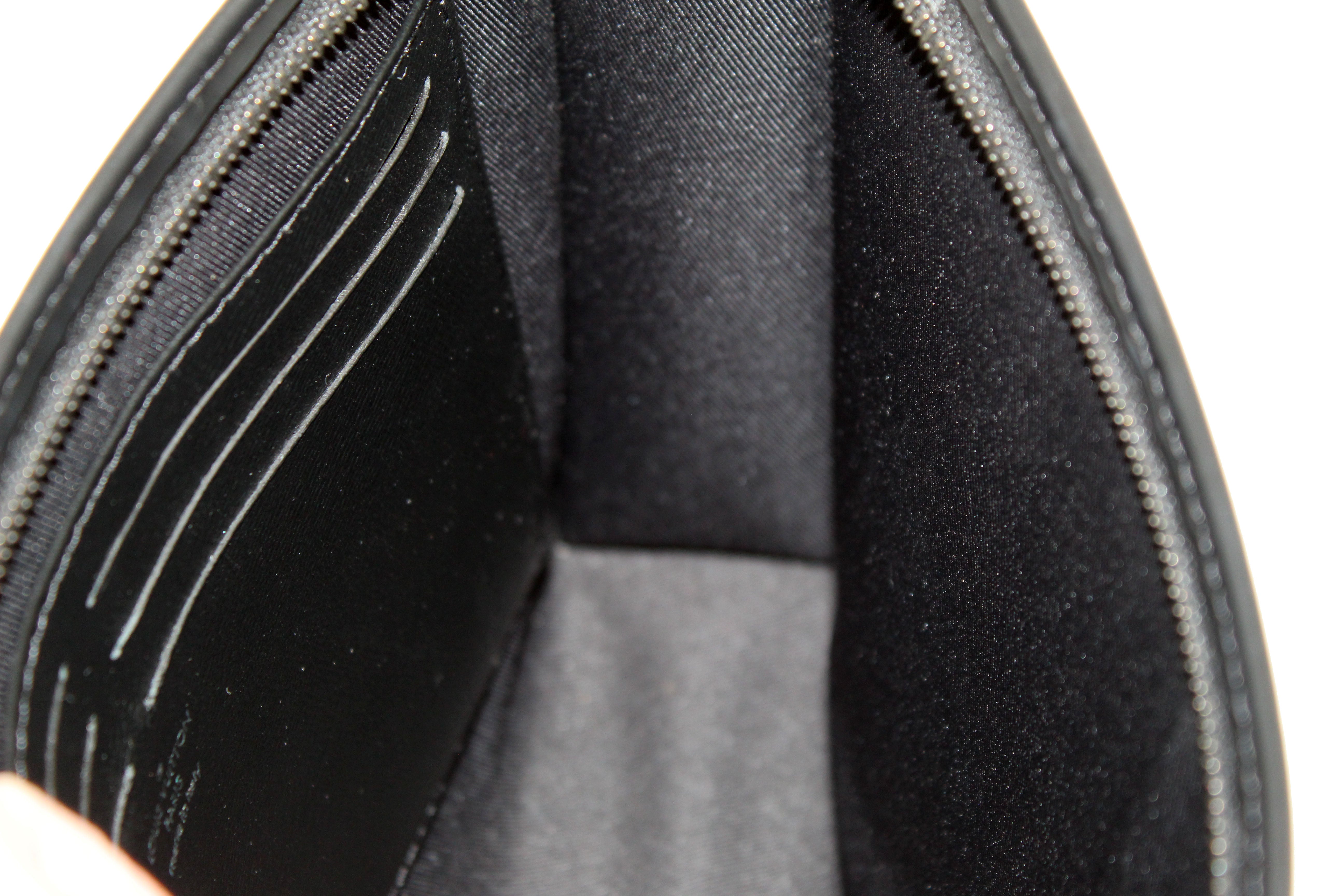 Authentic Louis Vuitton Monogram Eclipse Canvas Pochette Voyage MM Clutch
