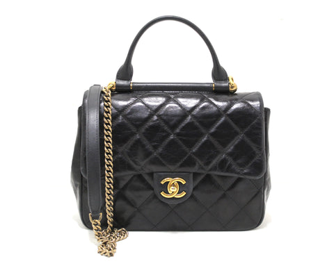 Authentic Chanel Black Aged Quilted Calfskin Leather Gold Bar Top Handle Medium Flap Bag