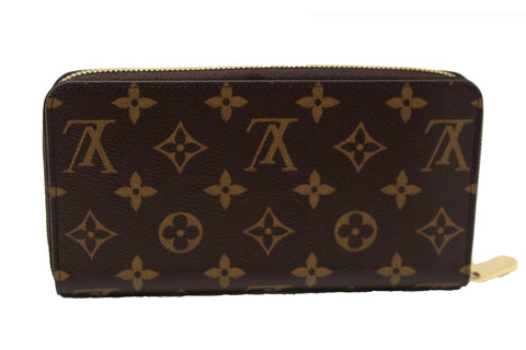 Authentic Louis Vuitton Classic Monogram Canvas Zippy Wallet
