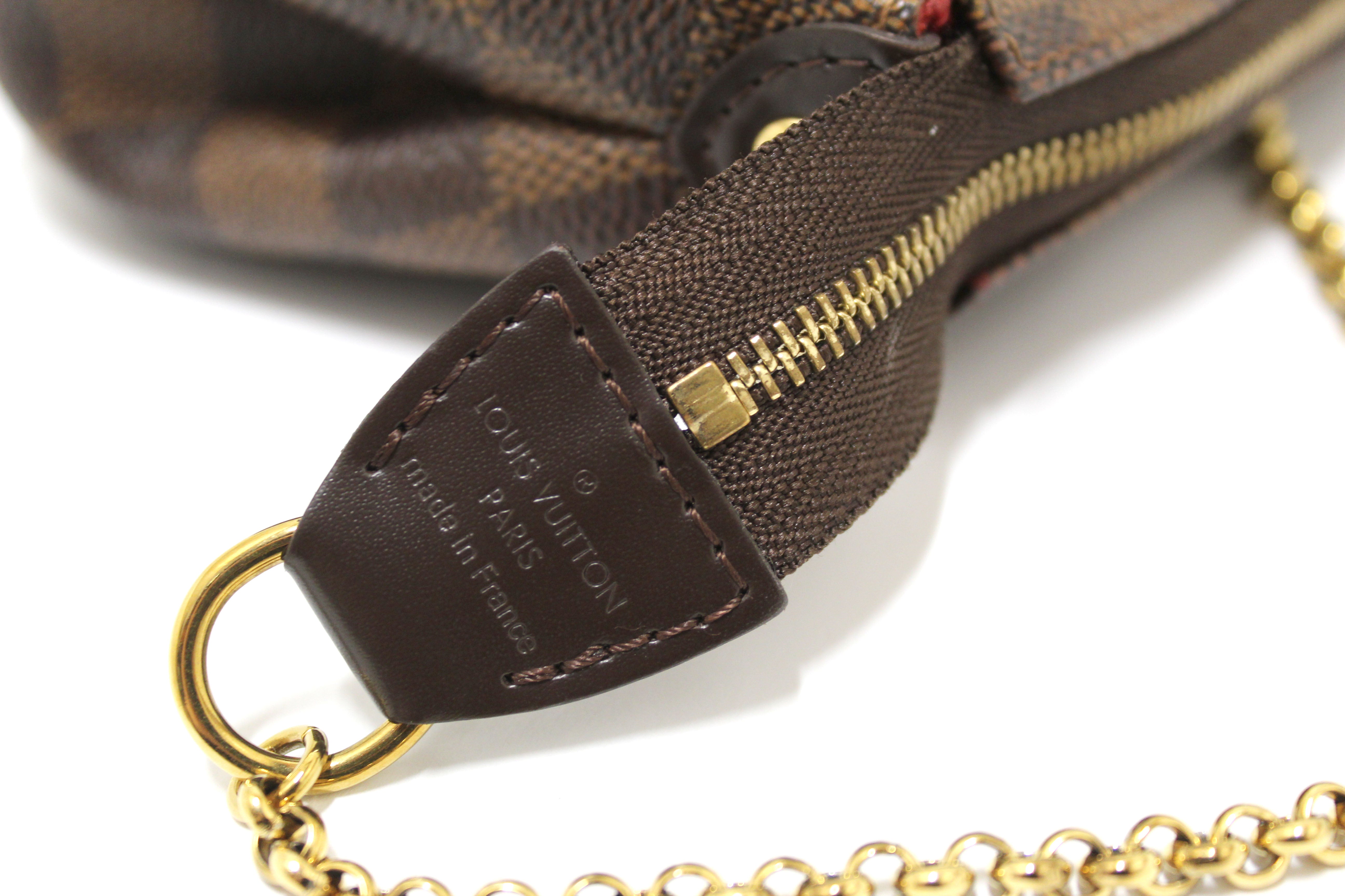 Authentic Louis Vuitton Damier Ebene Canvas Eva Clutch Bag