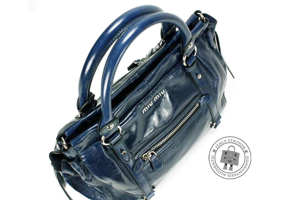 MIU MIU Miu Miu RN0954 X72 Vitello Lux  Shopping Bluette / F0016 Calfs | Italystation.com - Shop Now at italystation.com