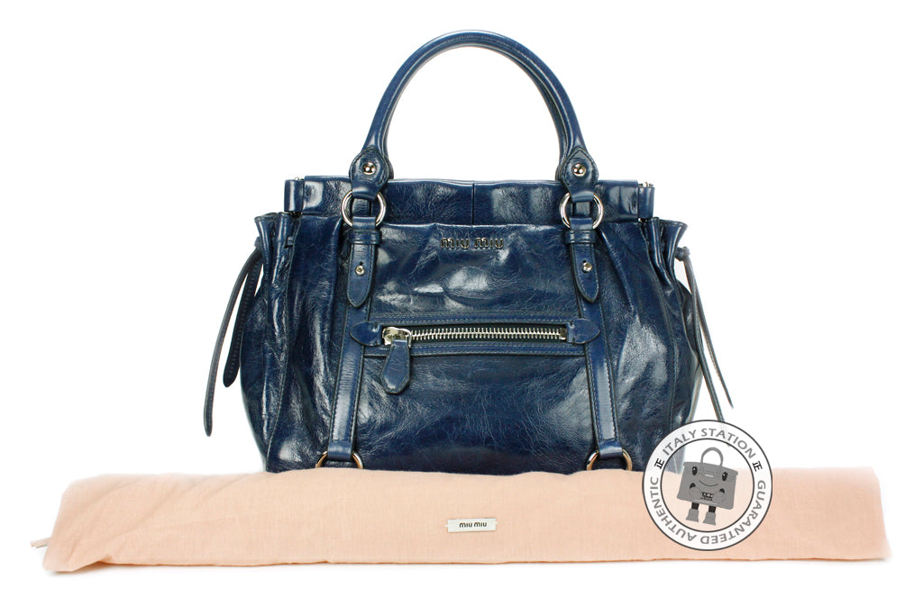 MIU MIU Miu Miu RN0954 X72 Vitello Lux  Shopping Bluette / F0016 Calfs | Italystation.com - Shop Now at italystation.com