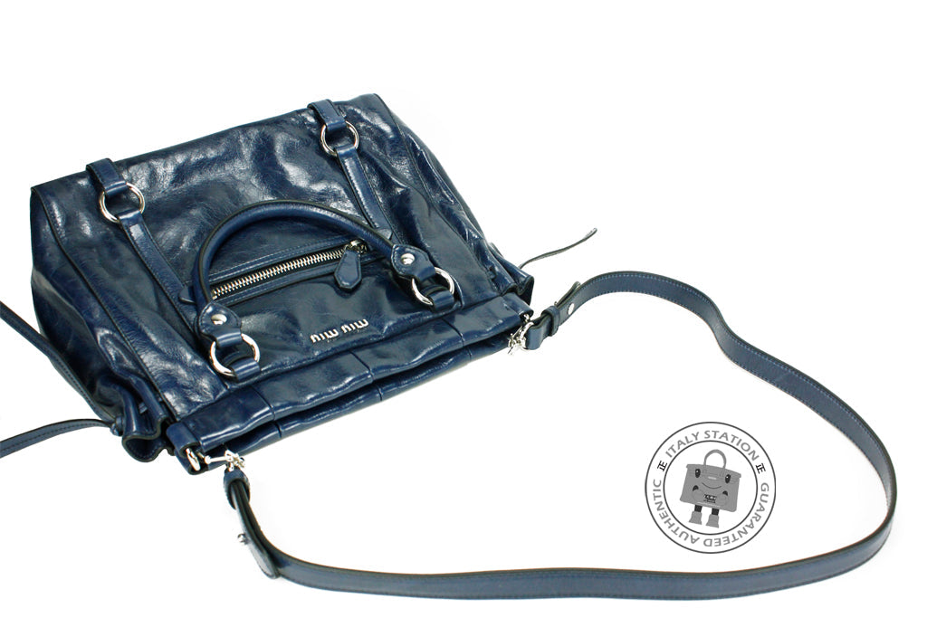 MIU MIU Miu Miu RN0954 X72 Vitello Lux  Shopping Bluette / F0016 Calfs | Italystation.com - Shop Now at italystation.com