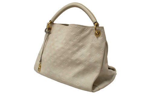 Authentic Louis Vuitton White Monogram Empreinte Leather Artsy MM Hobo Bag