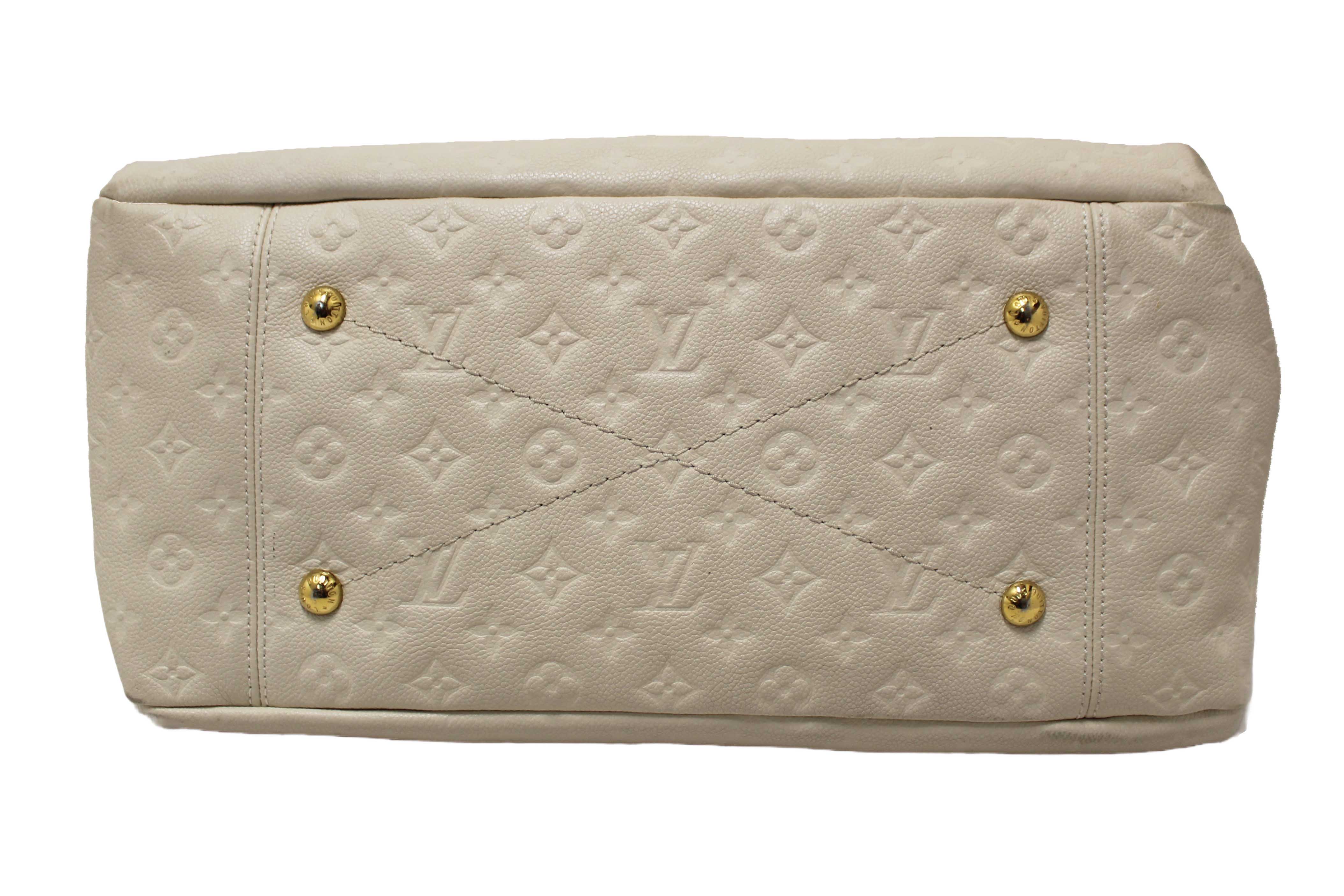 Authentic Louis Vuitton White Monogram Empreinte Leather Artsy MM Hobo Bag