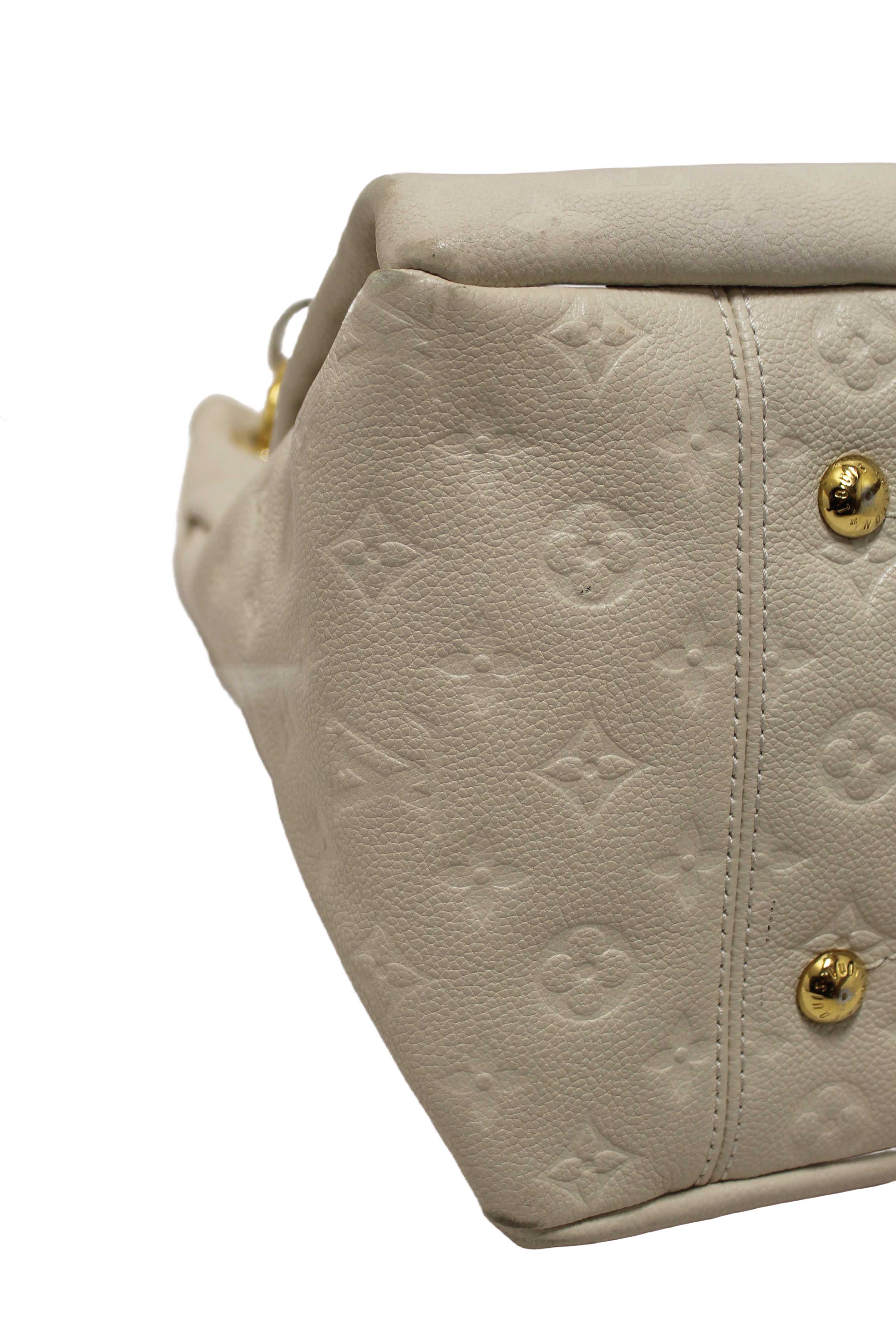 Authentic Louis Vuitton White Monogram Empreinte Leather Artsy MM Hobo Bag