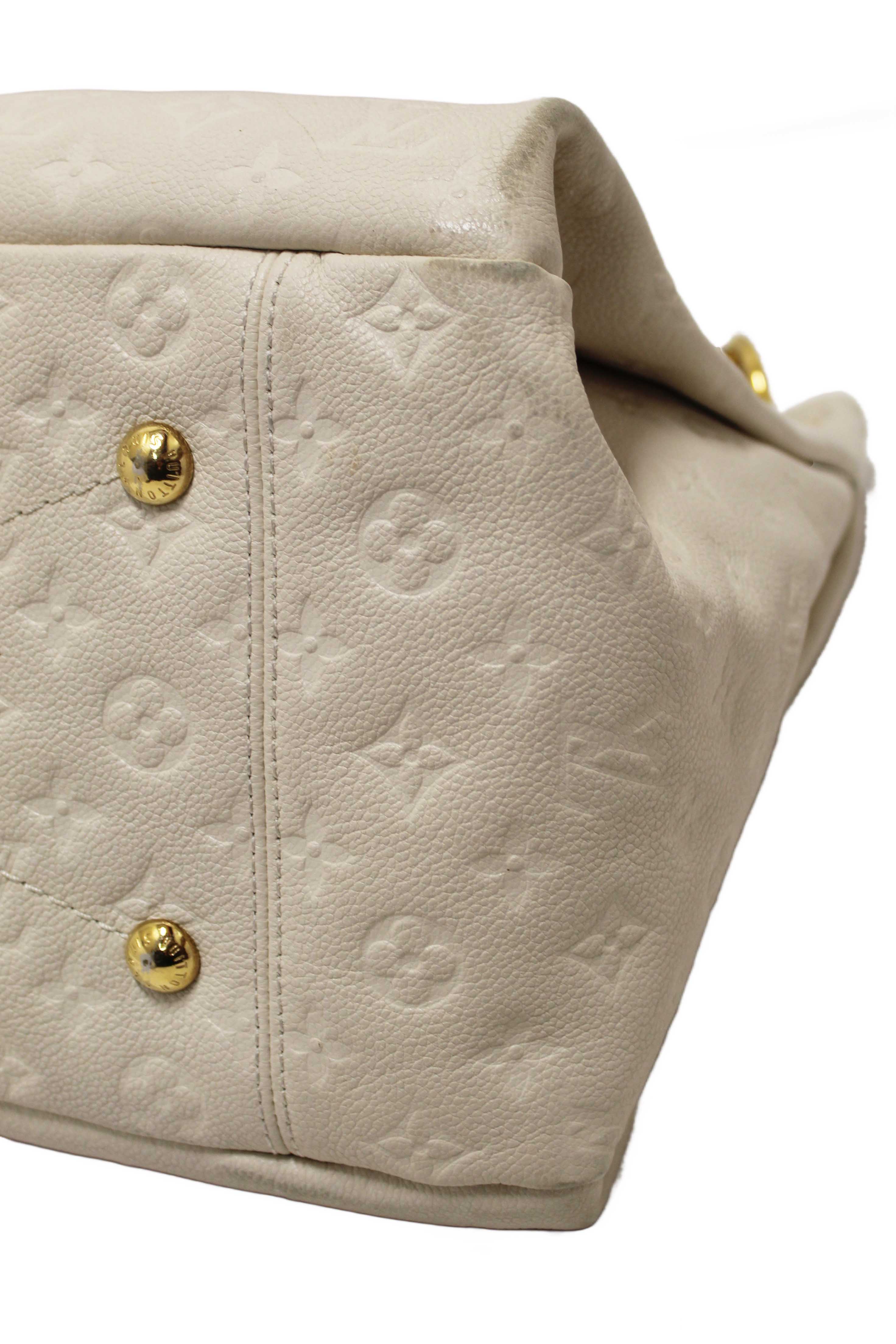 Authentic Louis Vuitton White Monogram Empreinte Leather Artsy MM Hobo Bag