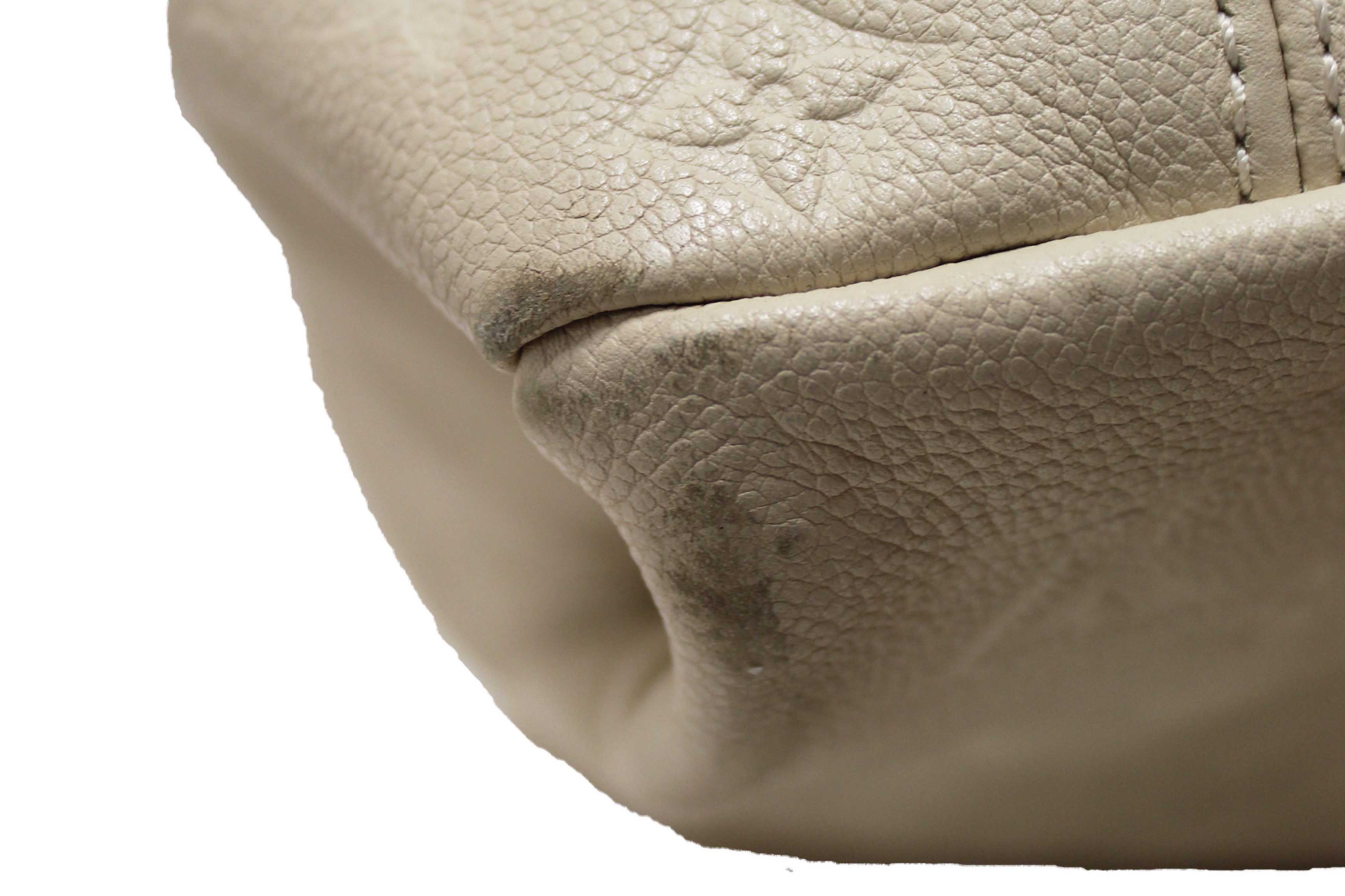 Authentic Louis Vuitton White Monogram Empreinte Leather Artsy MM Hobo Bag