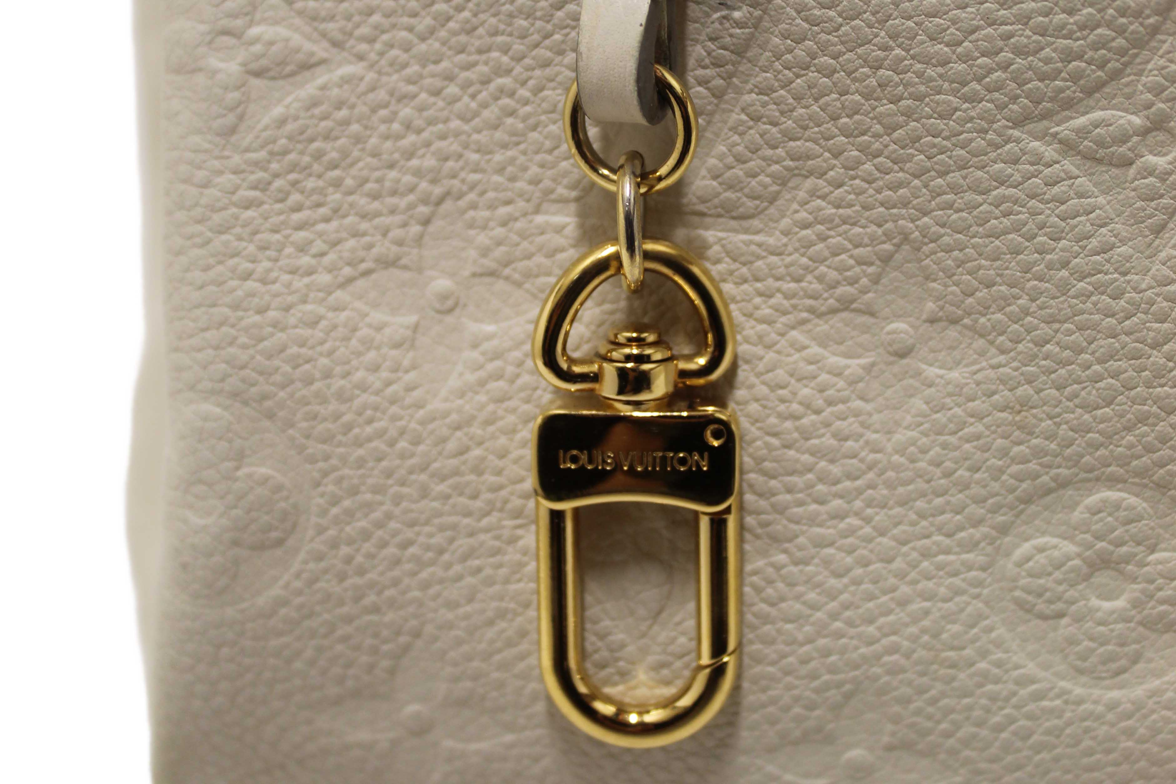 Authentic Louis Vuitton White Monogram Empreinte Leather Artsy MM Hobo Bag