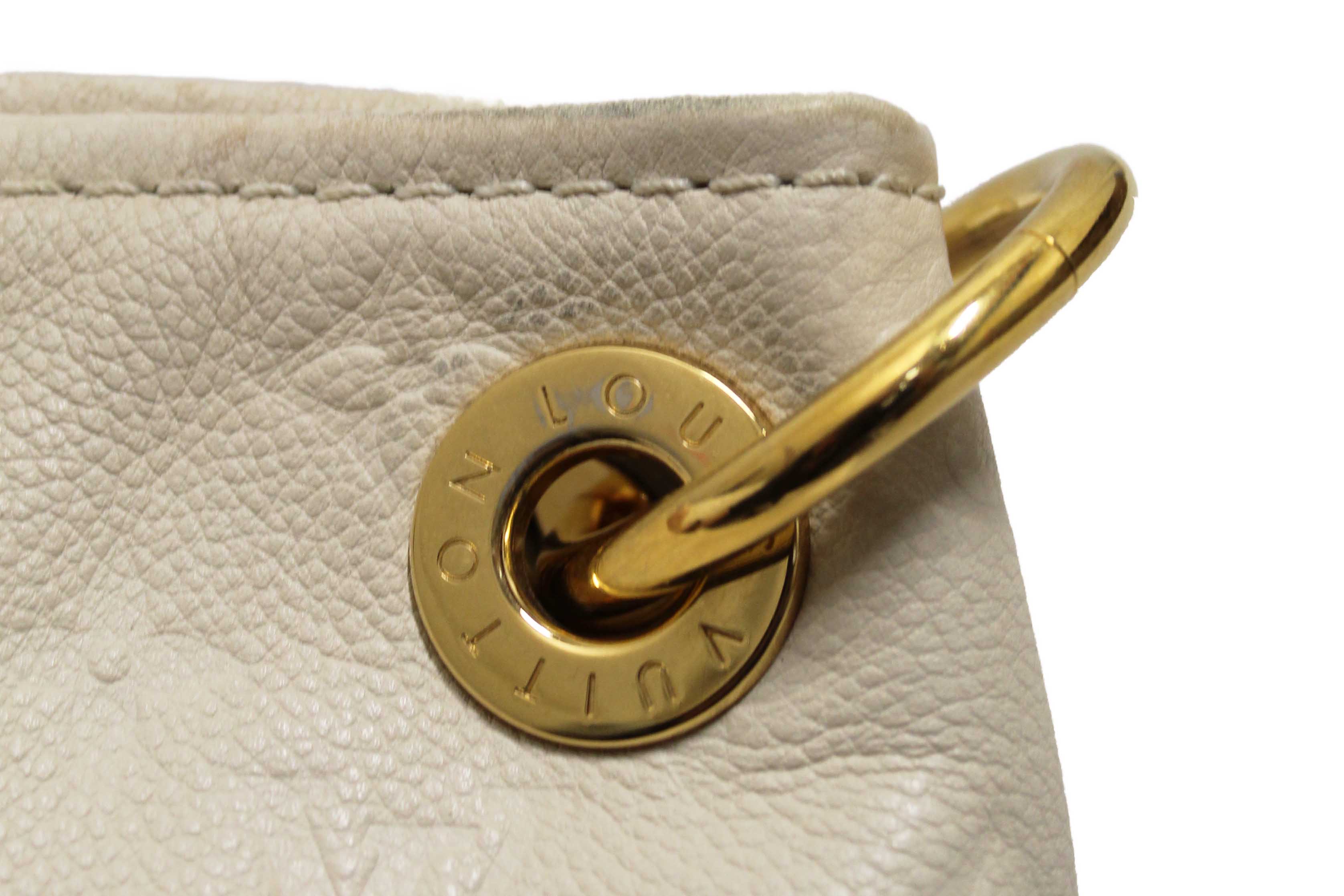 Authentic Louis Vuitton White Monogram Empreinte Leather Artsy MM Hobo Bag