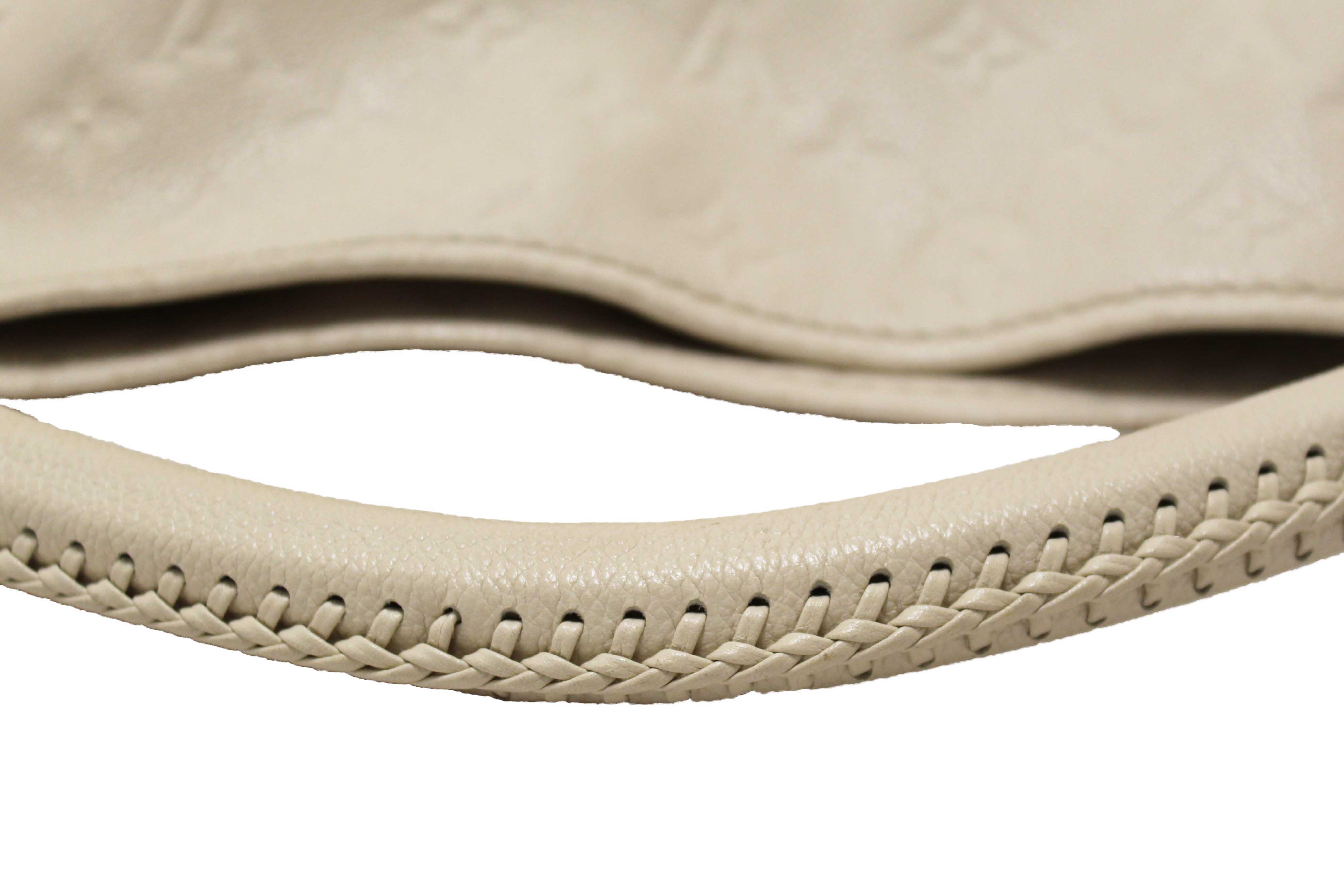 Authentic Louis Vuitton White Monogram Empreinte Leather Artsy MM Hobo Bag