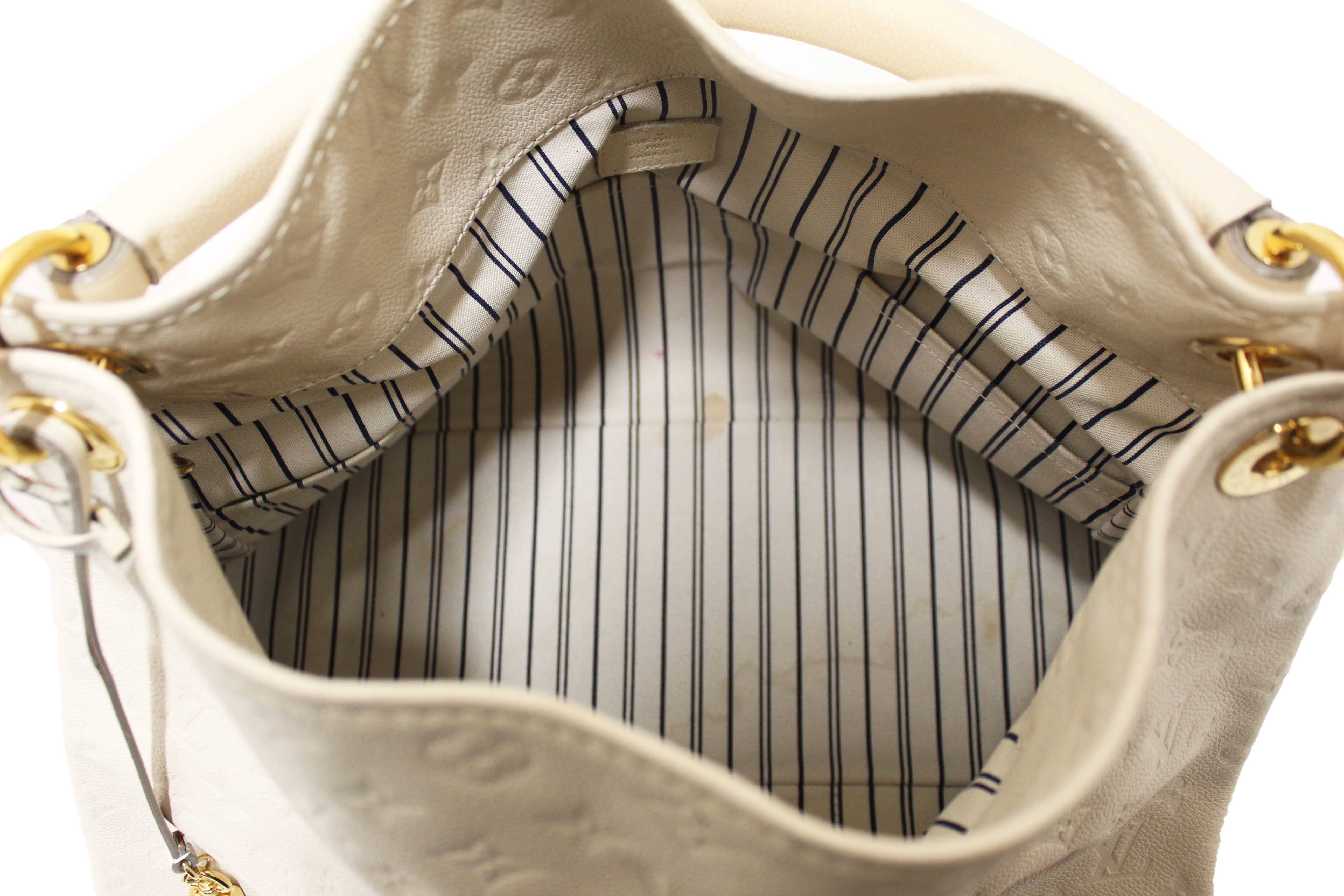 Authentic Louis Vuitton White Monogram Empreinte Leather Artsy MM Hobo Bag