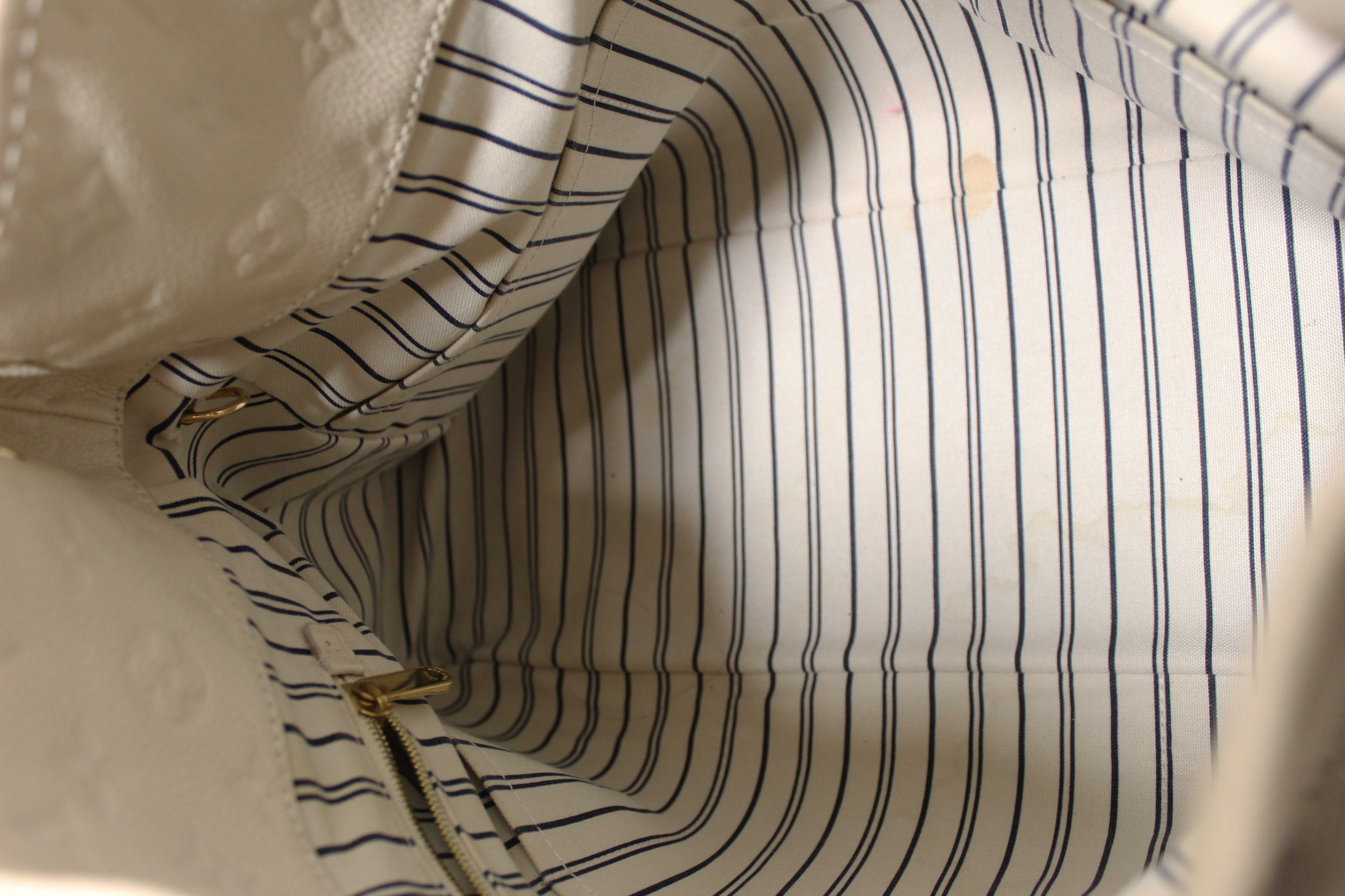 Authentic Louis Vuitton White Monogram Empreinte Leather Artsy MM Hobo Bag