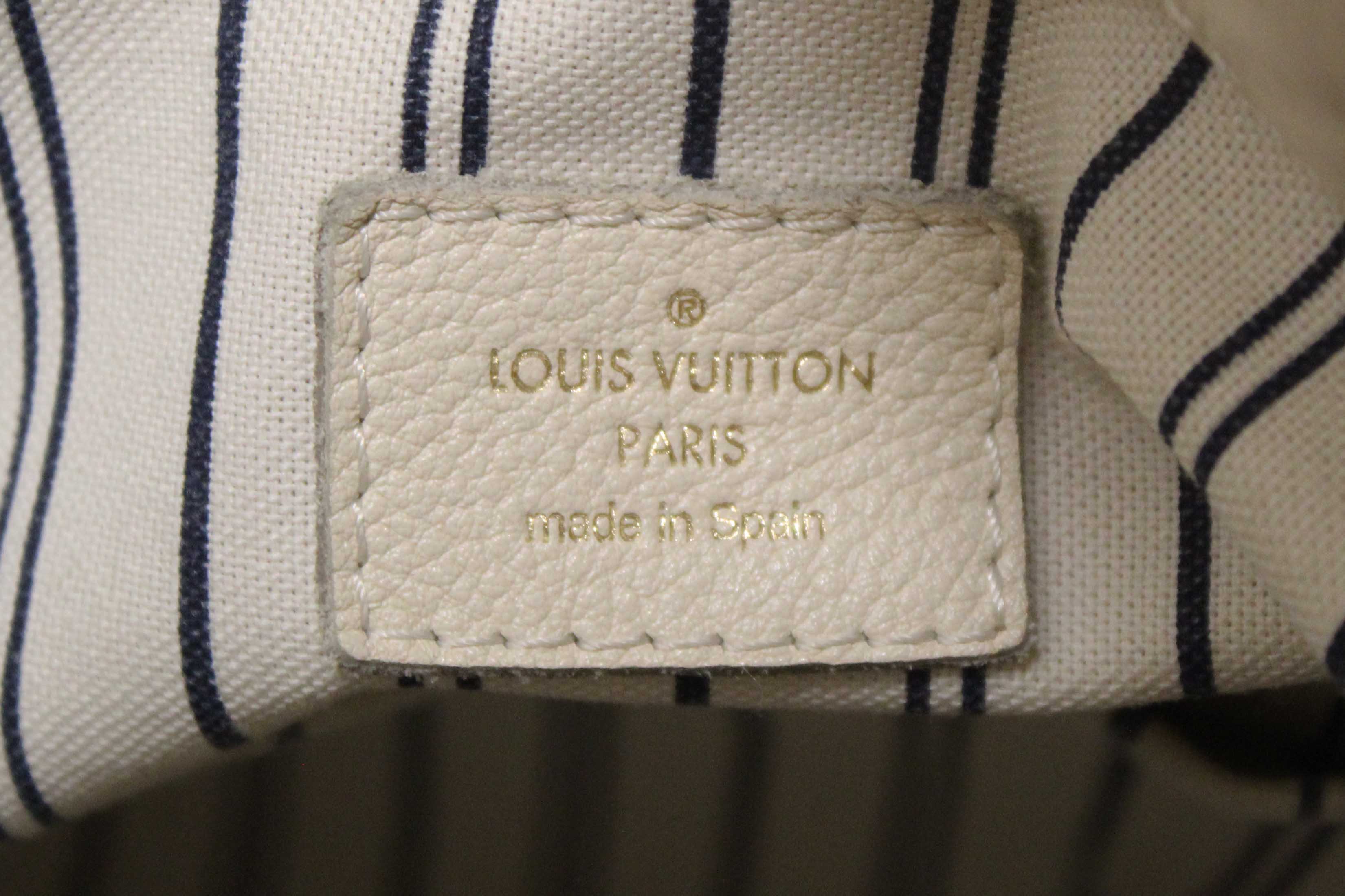 Authentic Louis Vuitton White Monogram Empreinte Leather Artsy MM Hobo Bag