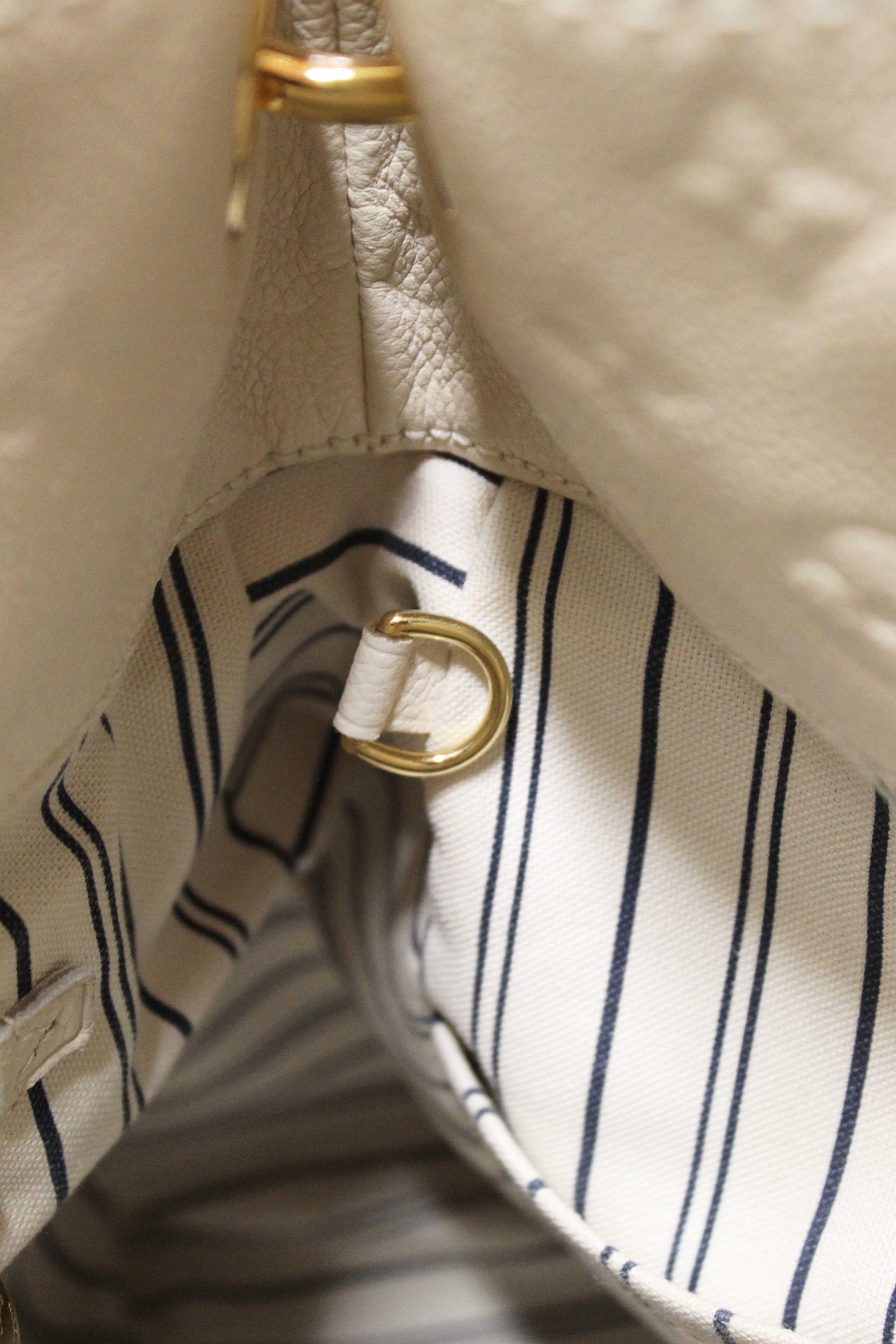 Authentic Louis Vuitton White Monogram Empreinte Leather Artsy MM Hobo Bag