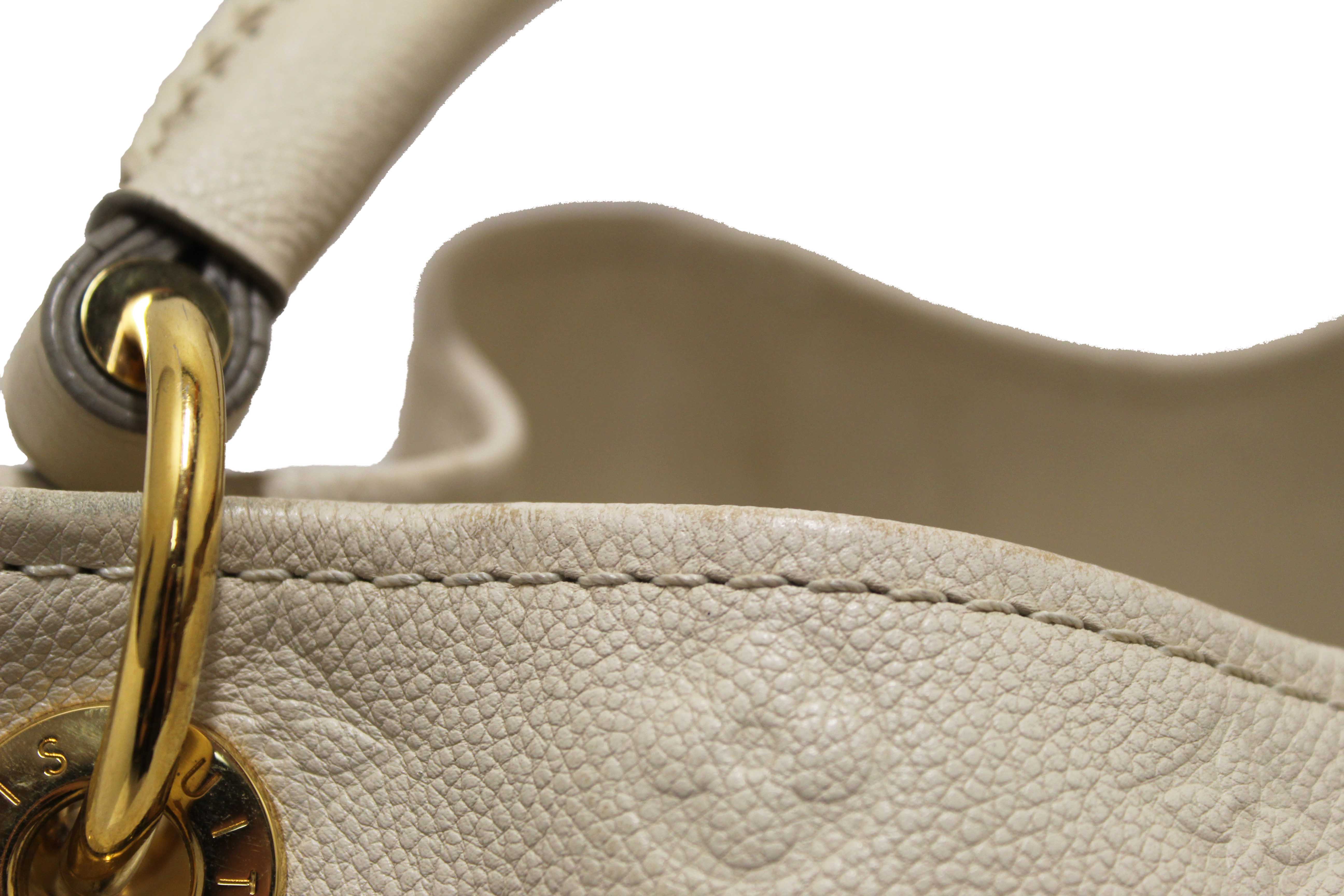 Authentic Louis Vuitton White Monogram Empreinte Leather Artsy MM Hobo Bag