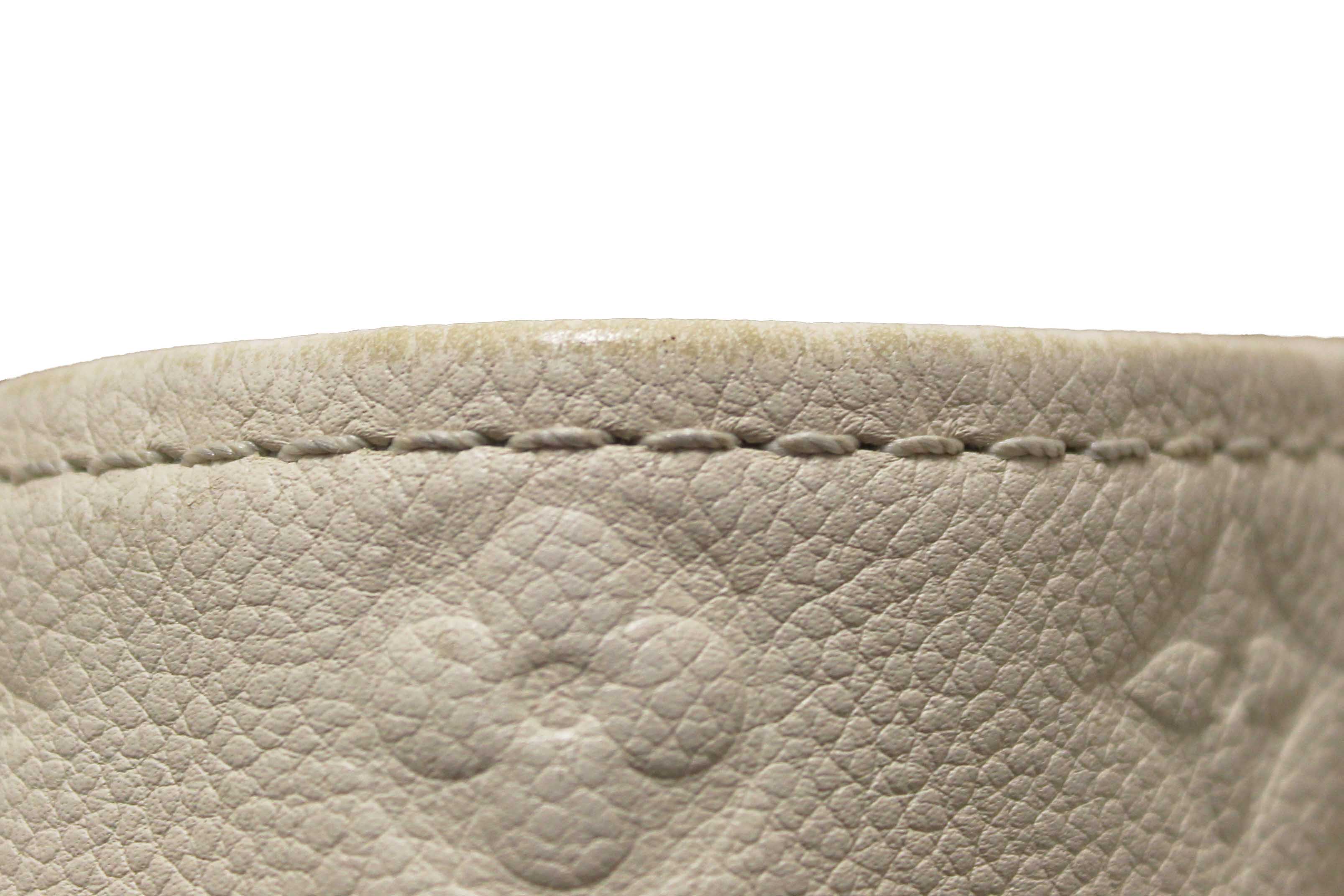 Authentic Louis Vuitton White Monogram Empreinte Leather Artsy MM Hobo Bag