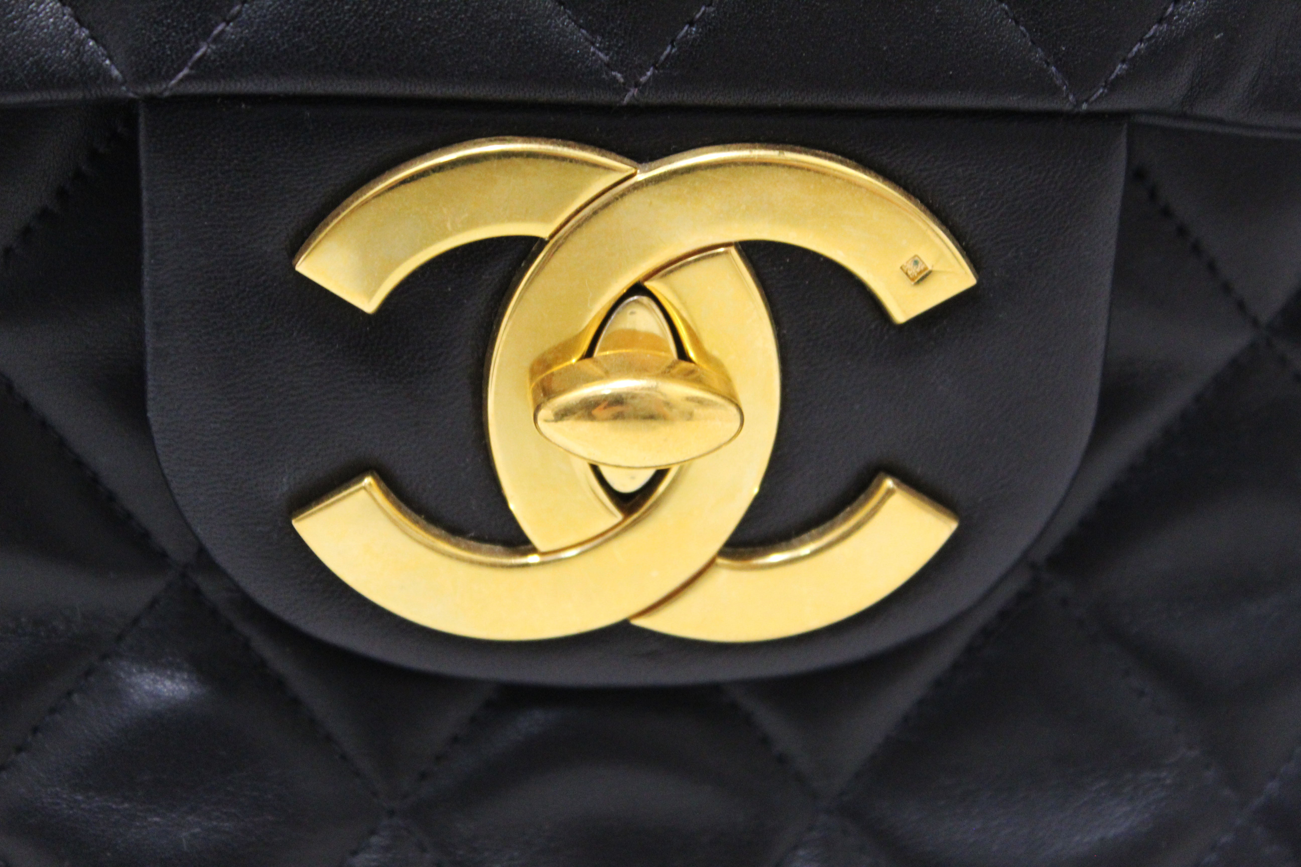 Authentic Chanel Vintage Black Quilted Lambskin Leather Classic Maxi Flap Bag