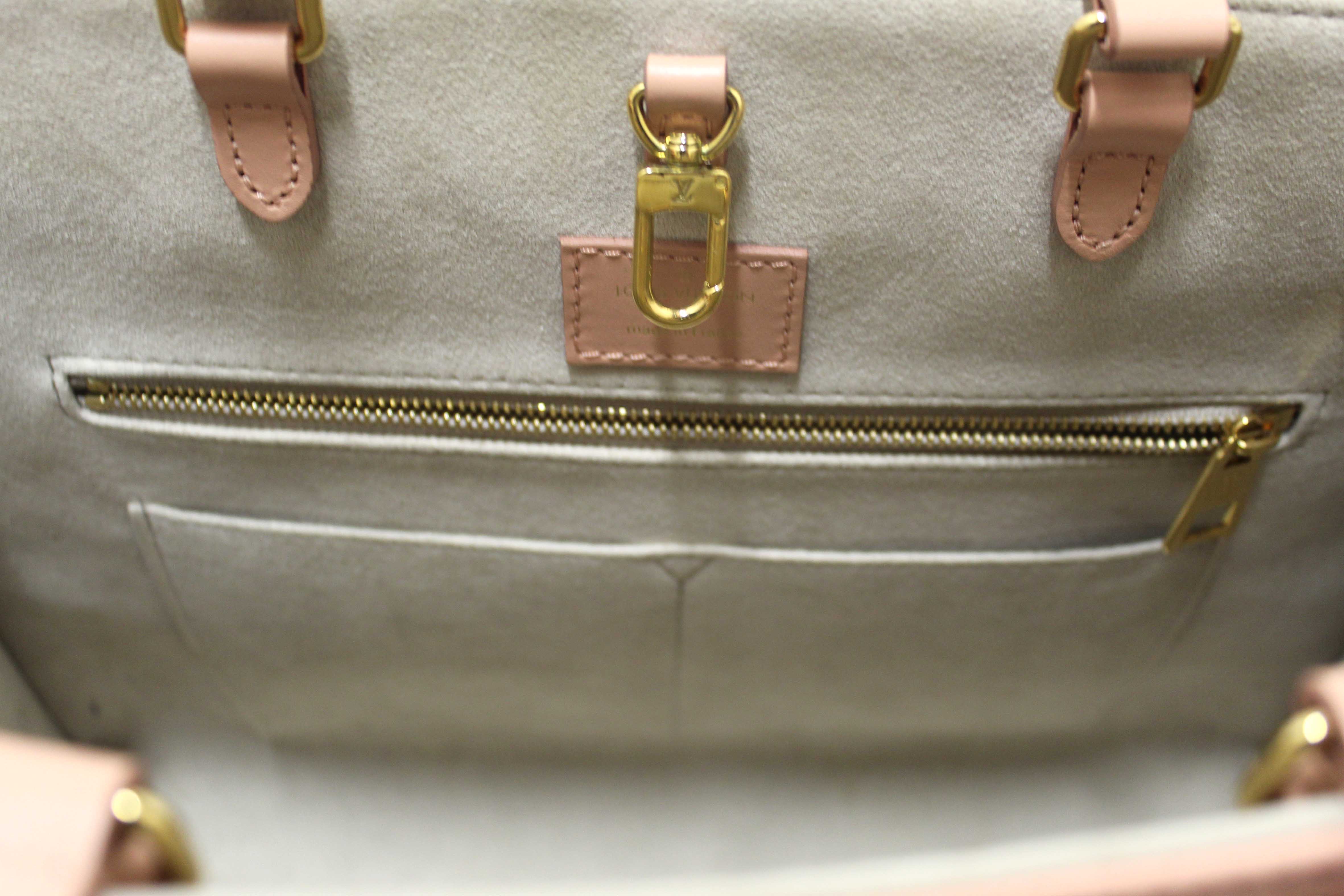 Authentic Louis Vuitton Pink Monogram Empreinte Cowhide Leather OnTheGo MM Bag