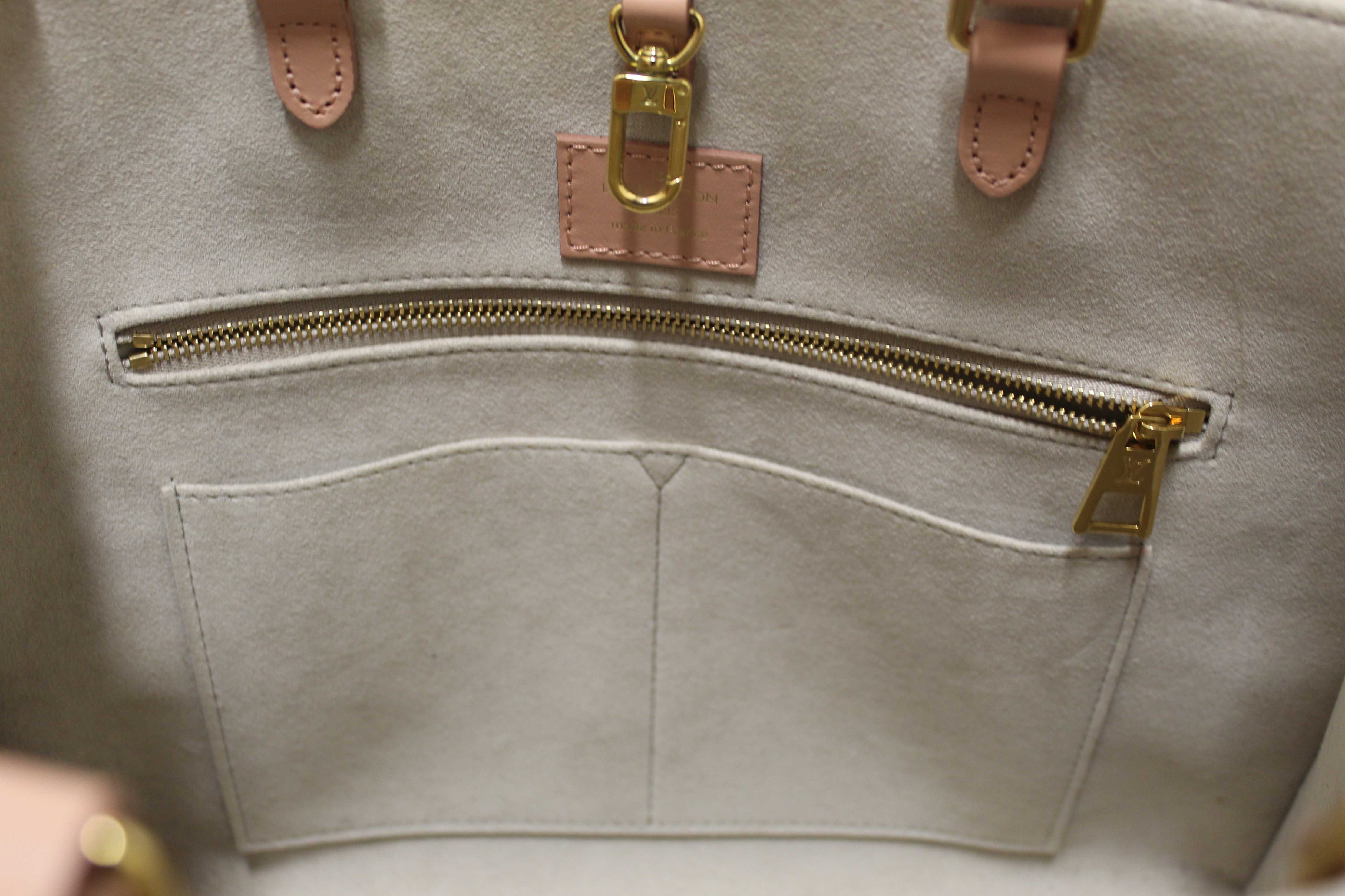 Authentic Louis Vuitton Pink Monogram Empreinte Cowhide Leather OnTheGo MM Bag