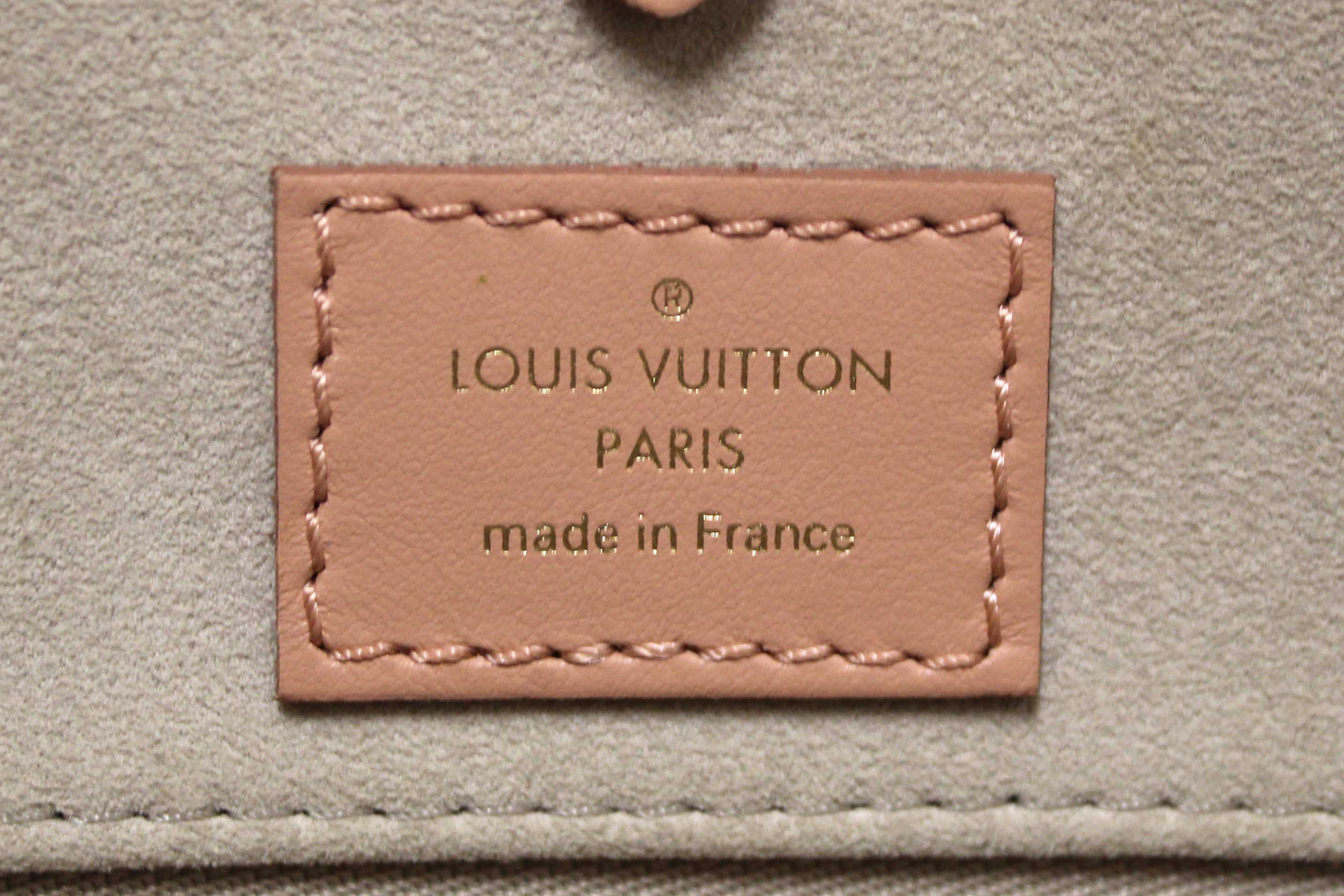 Authentic Louis Vuitton Pink Monogram Empreinte Cowhide Leather OnTheGo MM Bag