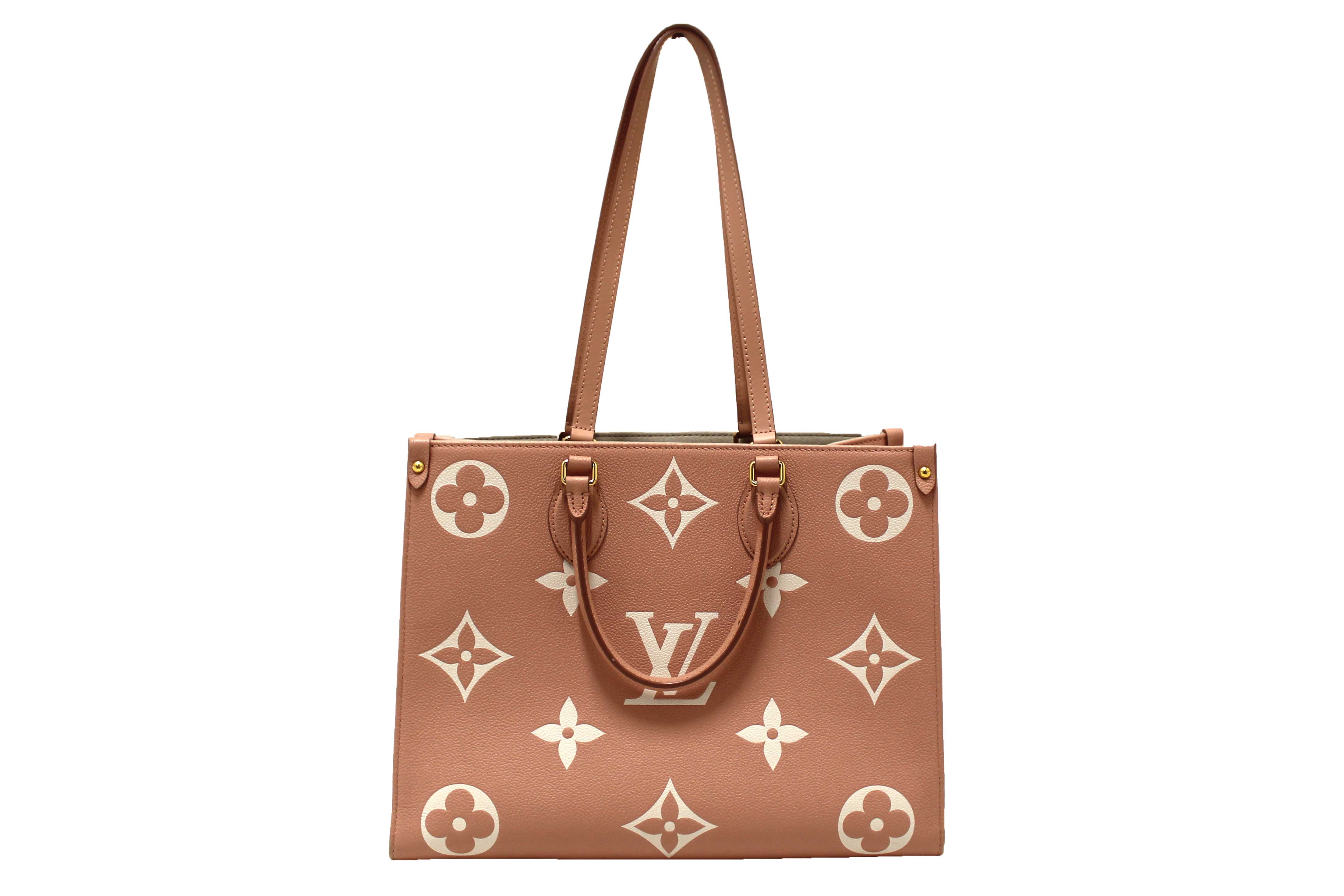 Authentic Louis Vuitton Pink Monogram Empreinte Cowhide Leather OnTheGo MM Bag