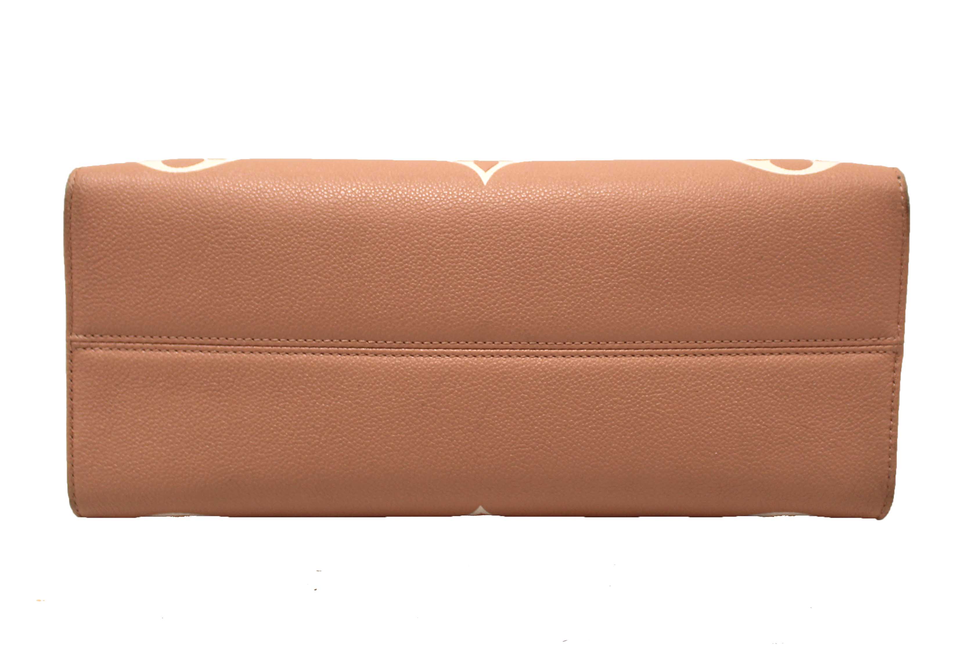Authentic Louis Vuitton Pink Monogram Empreinte Cowhide Leather OnTheGo MM Bag