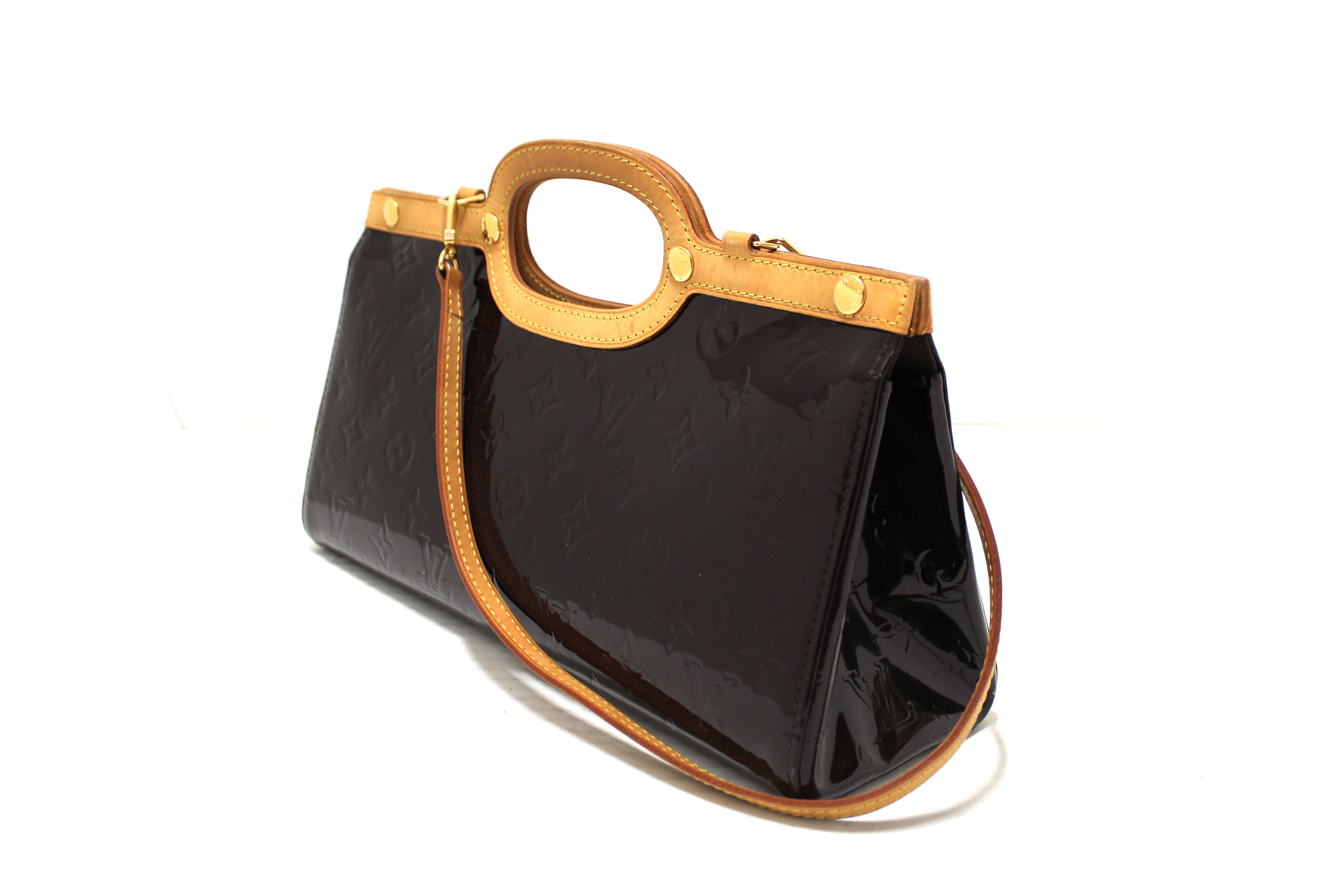 Authentic Louis Vuitton Amarante Monogram Vernis Leather Roxbury Drive Bag