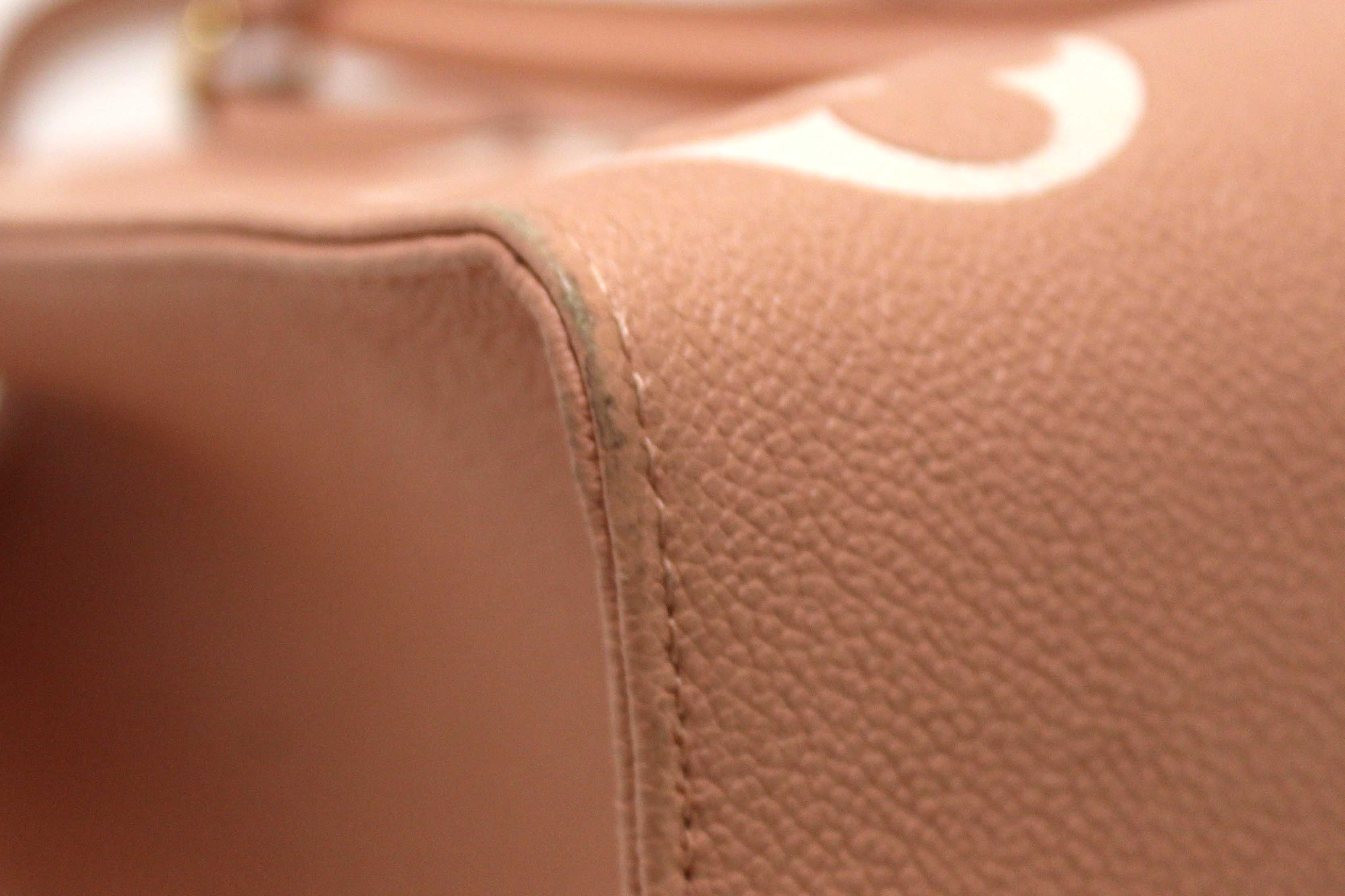 Authentic Louis Vuitton Pink Monogram Empreinte Cowhide Leather OnTheGo MM Bag