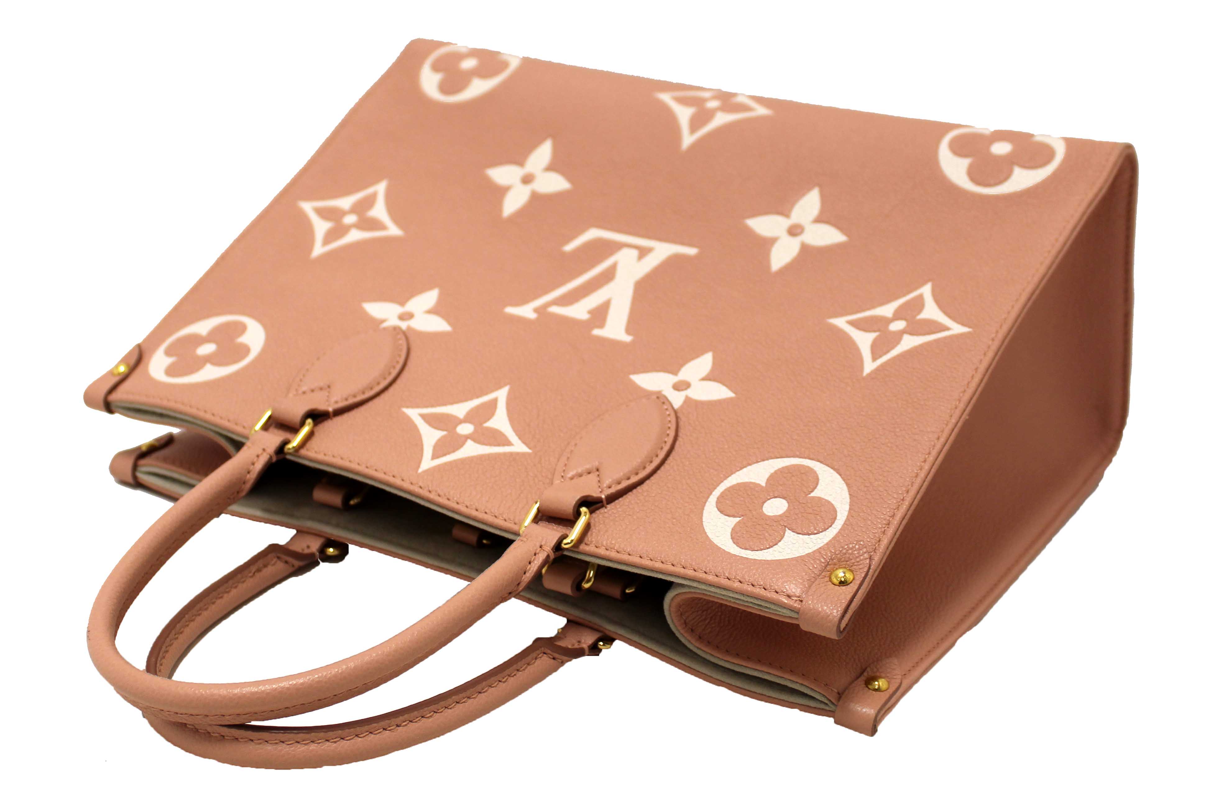 Authentic Louis Vuitton Pink Monogram Empreinte Cowhide Leather OnTheGo MM Bag