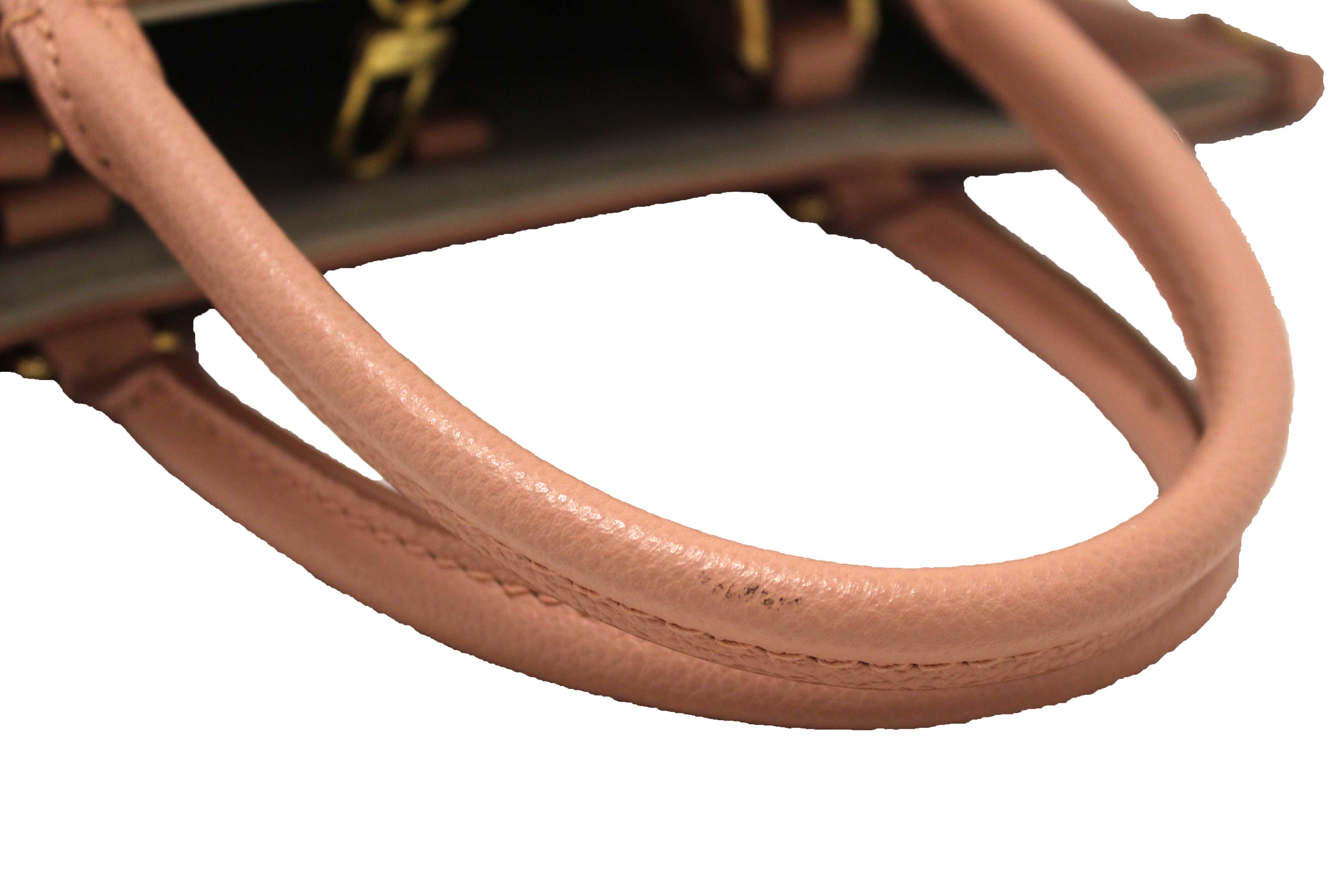 Authentic Louis Vuitton Pink Monogram Empreinte Cowhide Leather OnTheGo MM Bag