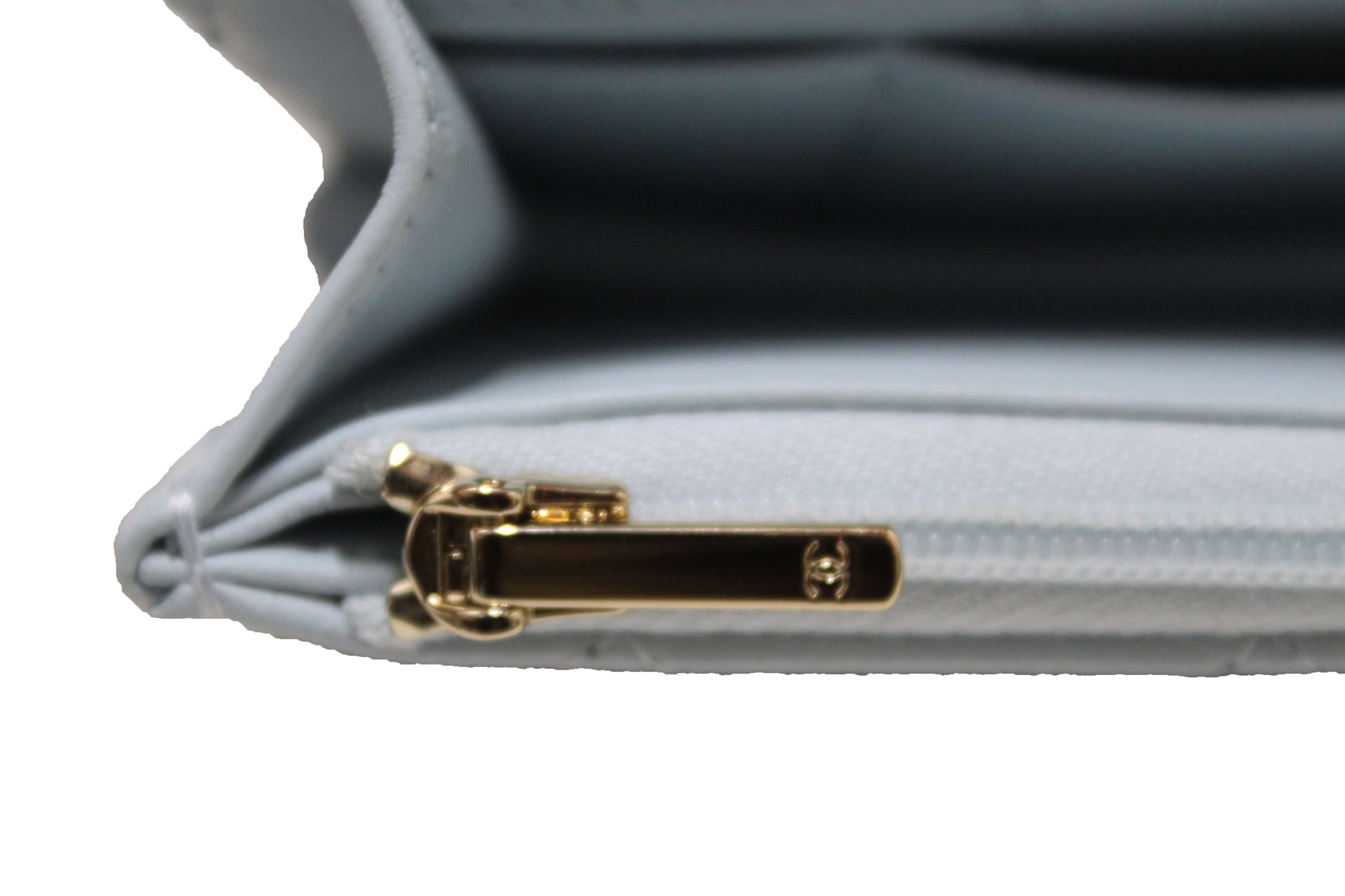 Authentic Chanel Light Blue Quilted Lambskin Leather Flap Phone Holder with Chain Crossbody Bag