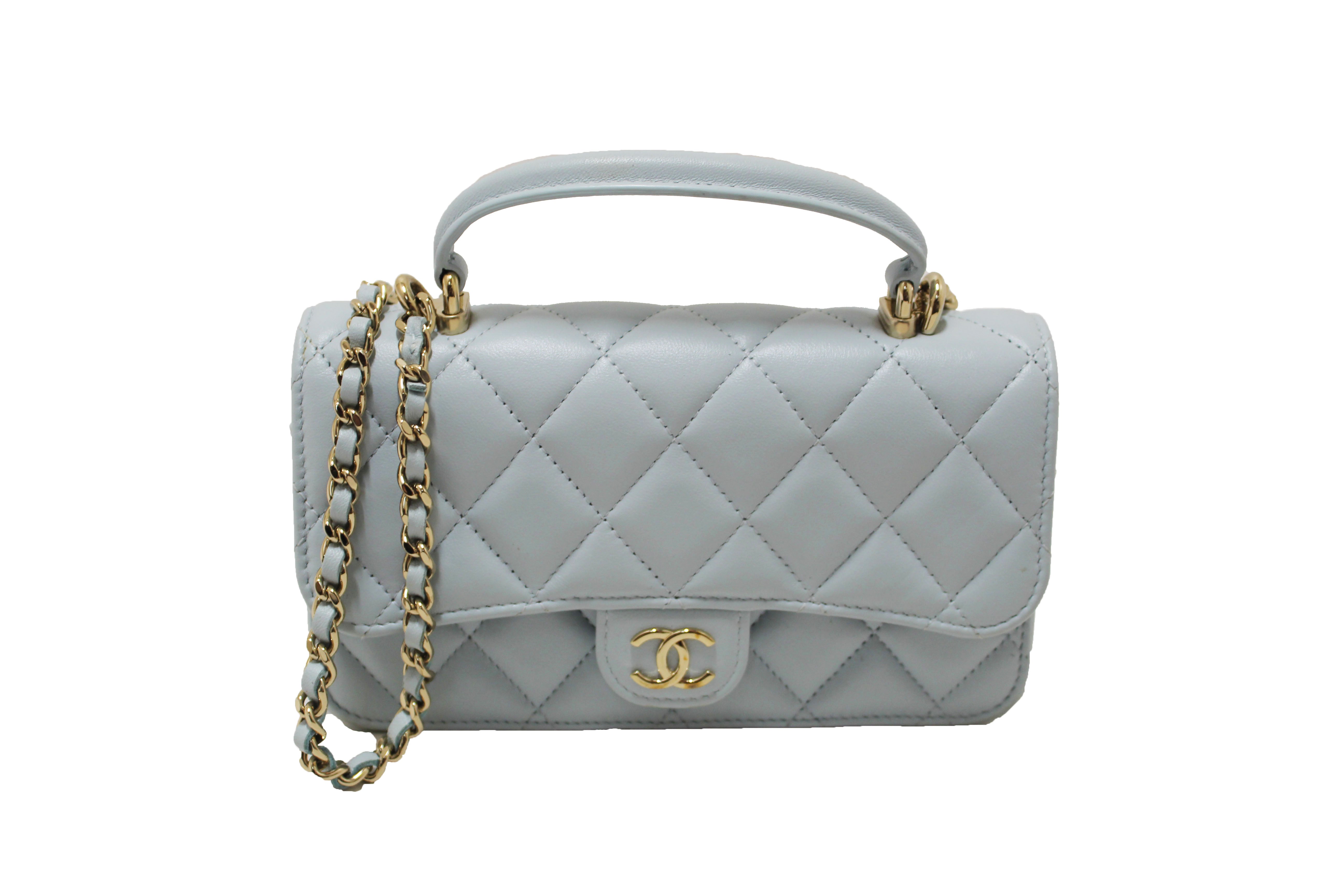 Authentic Chanel Light Blue Quilted Lambskin Leather Flap Phone Holder with Chain Crossbody Bag