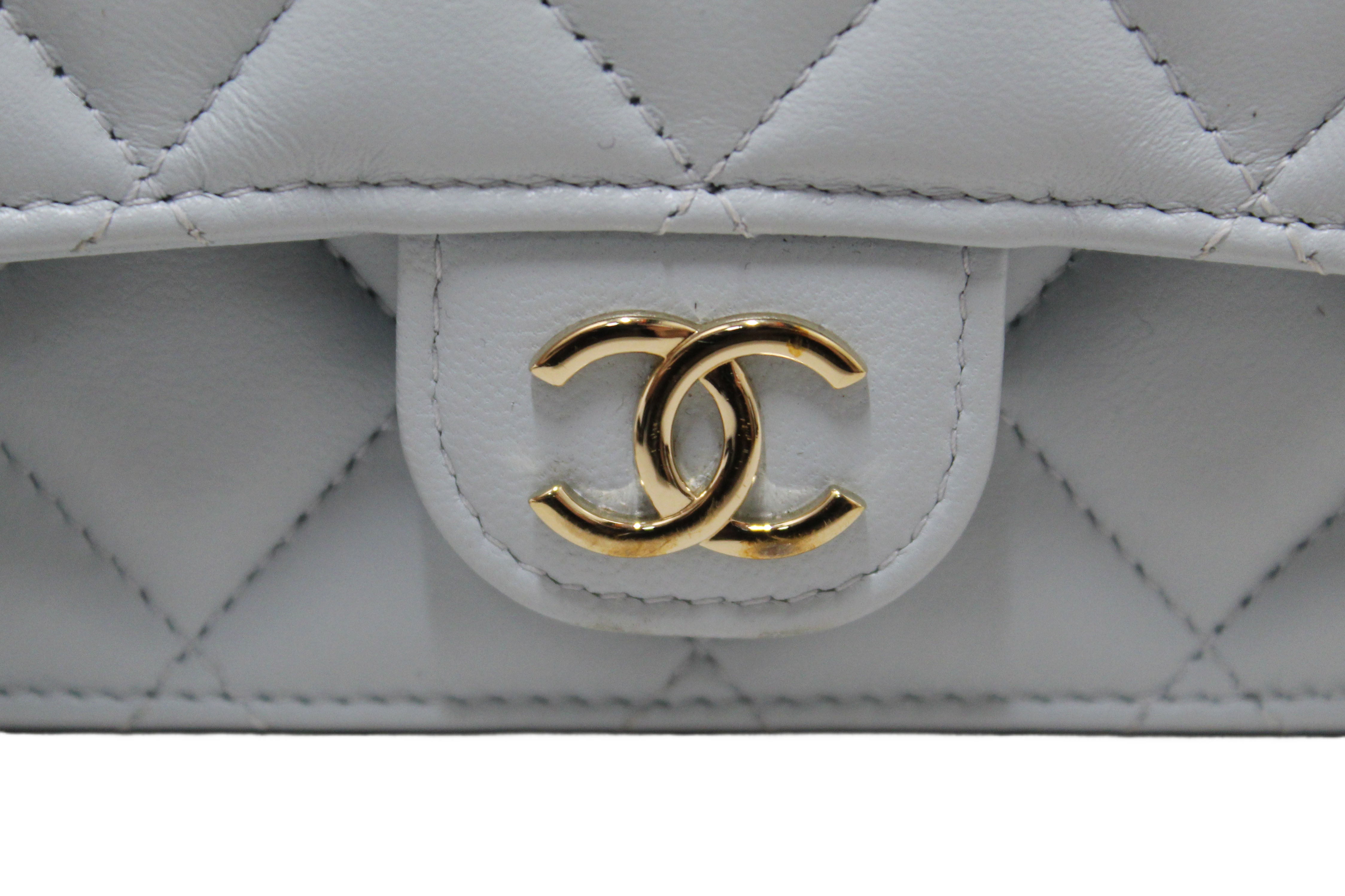 Authentic Chanel Light Blue Quilted Lambskin Leather Flap Phone Holder with Chain Crossbody Bag